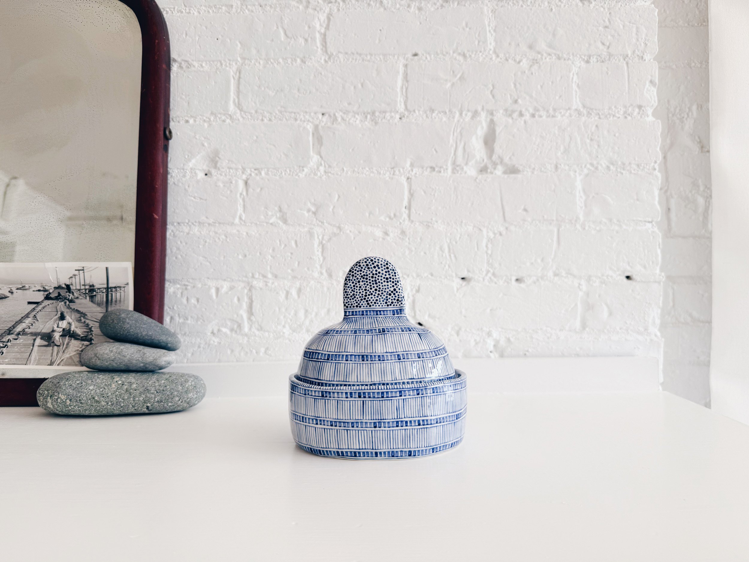 Blue and white, handmade ceramic jar.
