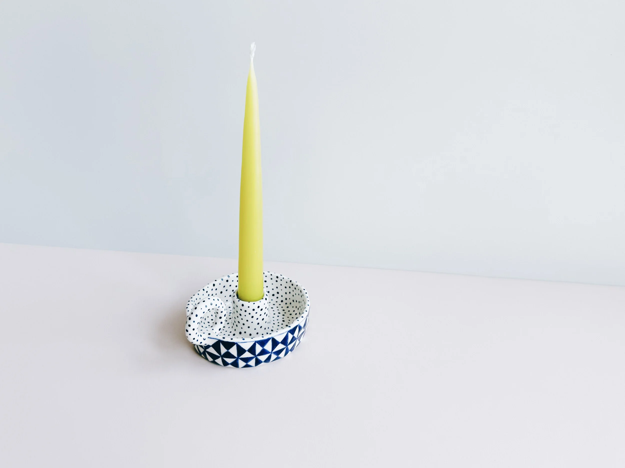 Blue and white, handmade ceramic candleholder.