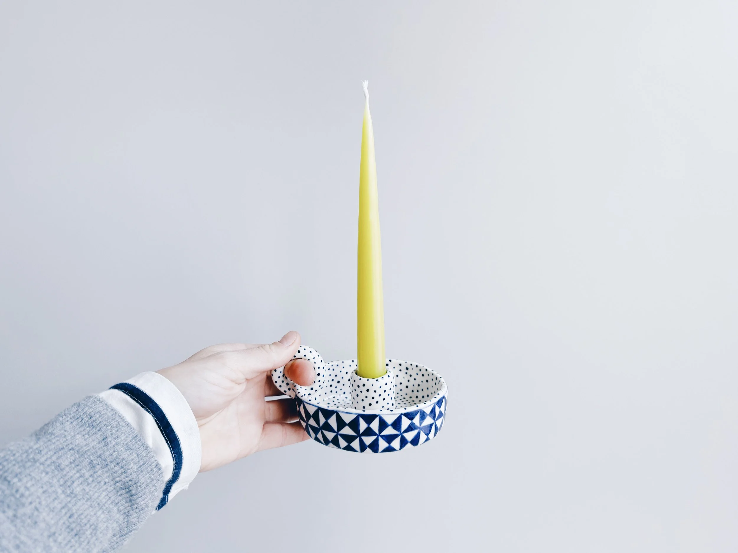 Blue and white, handmade ceramic candleholder.