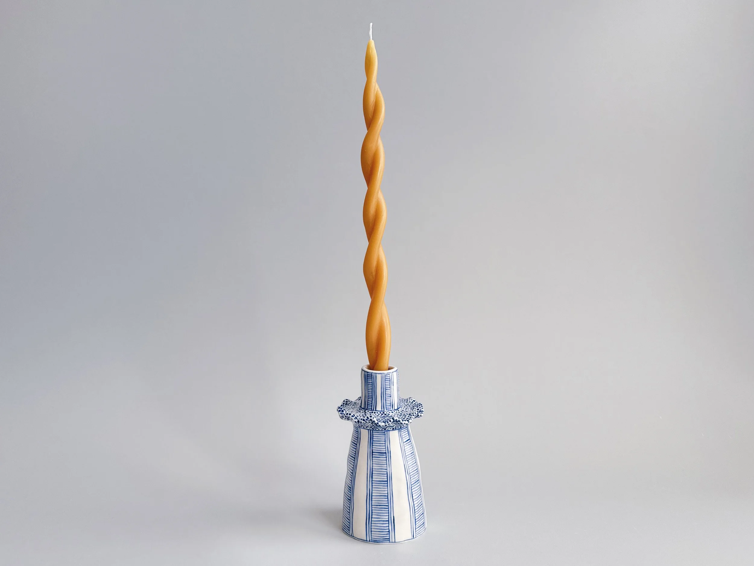Blue and white, handmade ceramic candleholder.