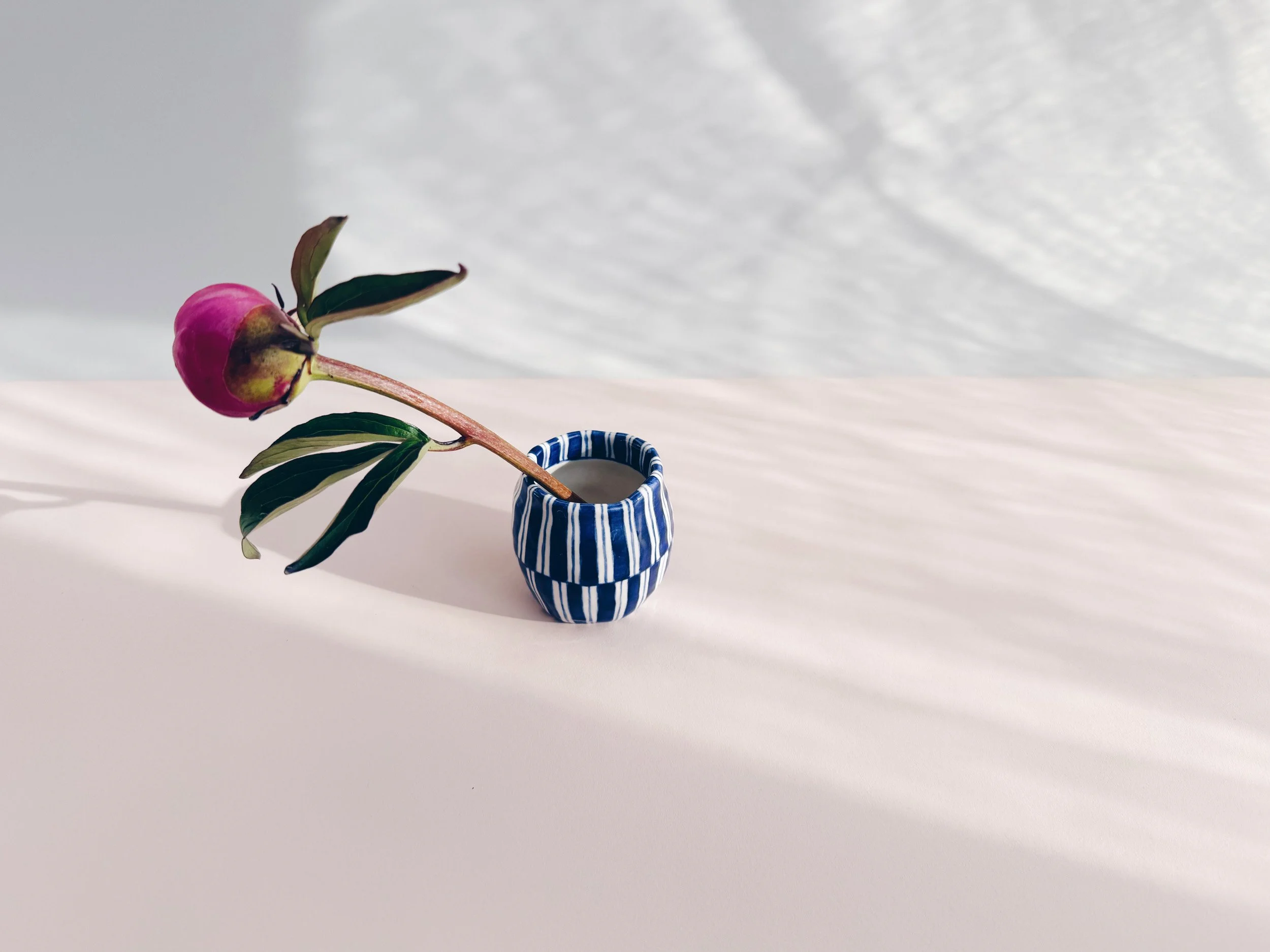 Blue and white, handmade ceramic vase.