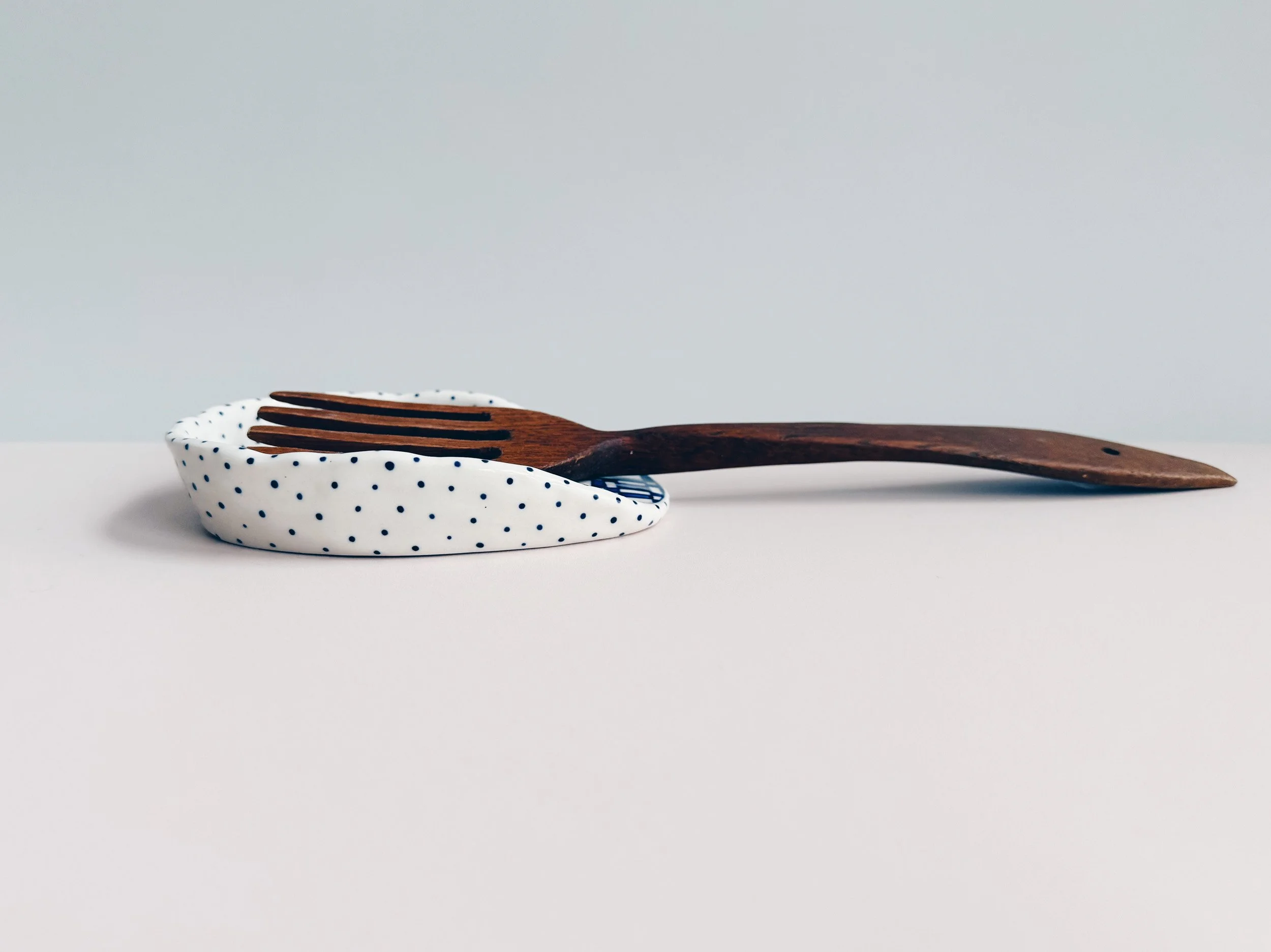 Blue and white, handmade ceramic spoon rest.