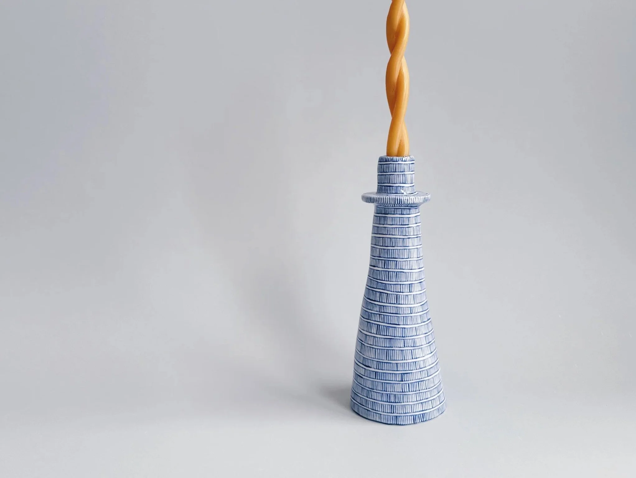Blue and white, handmade ceramic candleholder.