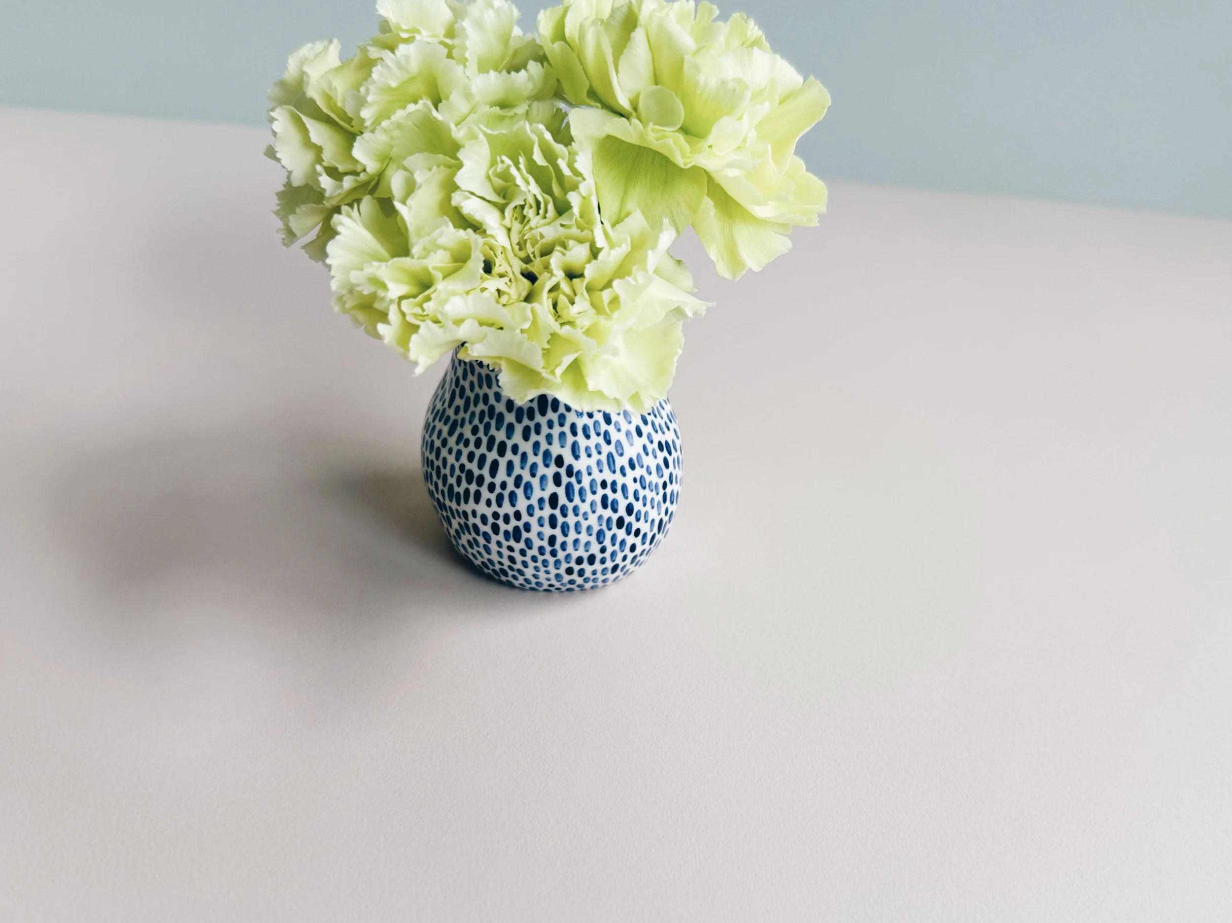 Blue and white, handmade ceramic vase.