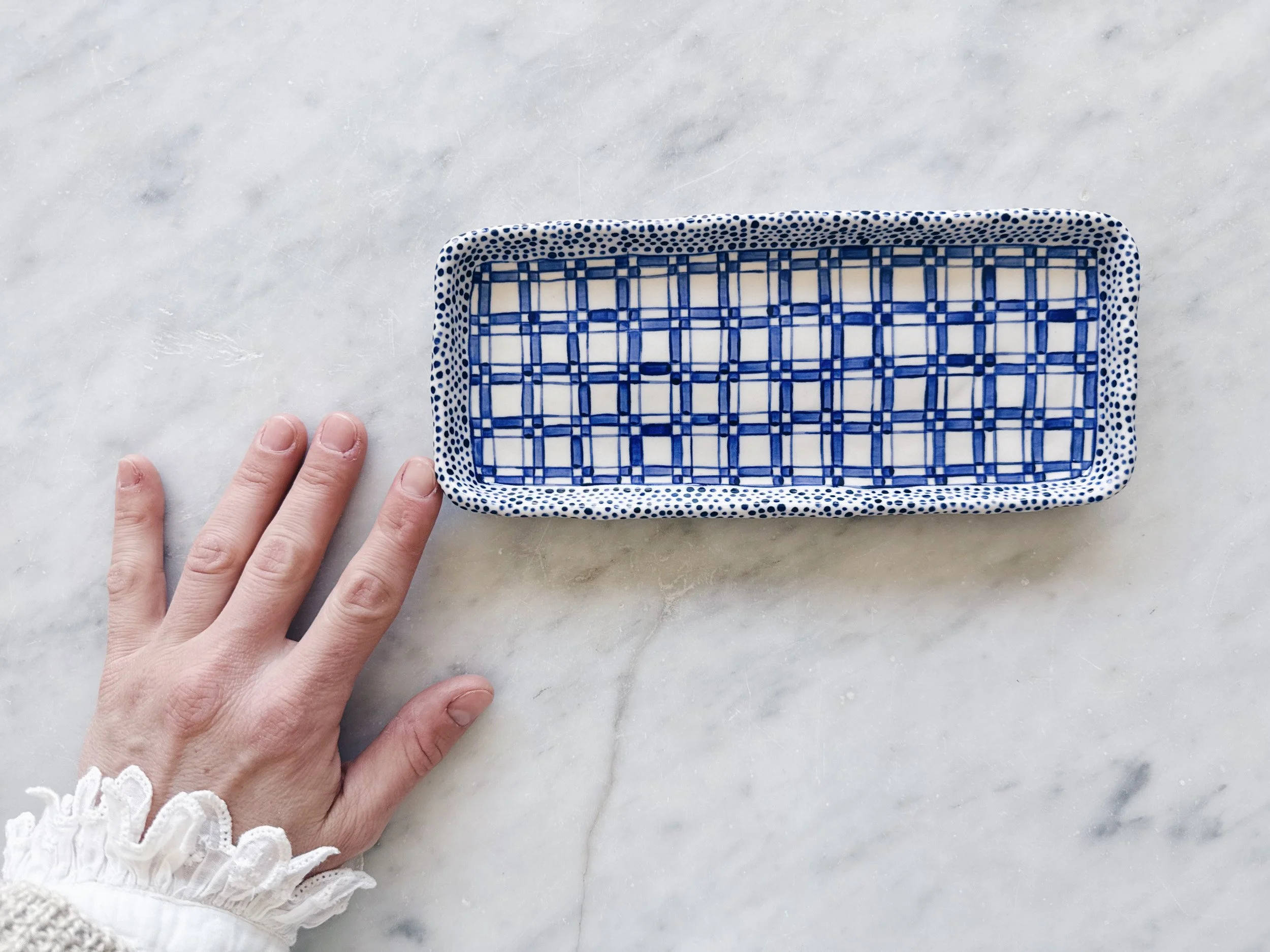 Blue and white, handmade ceramic plate.