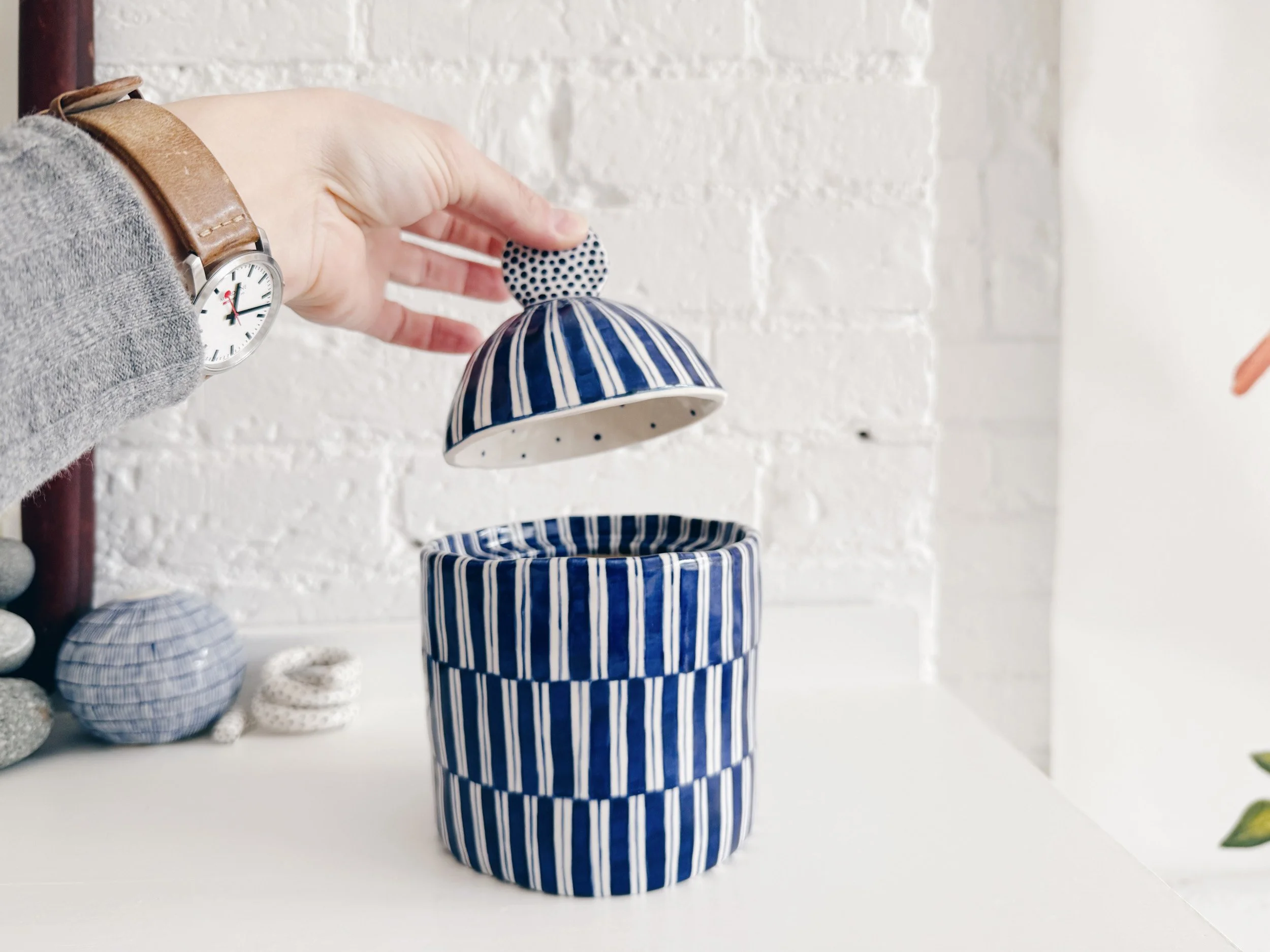 Blue and white, handmade ceramic jar.