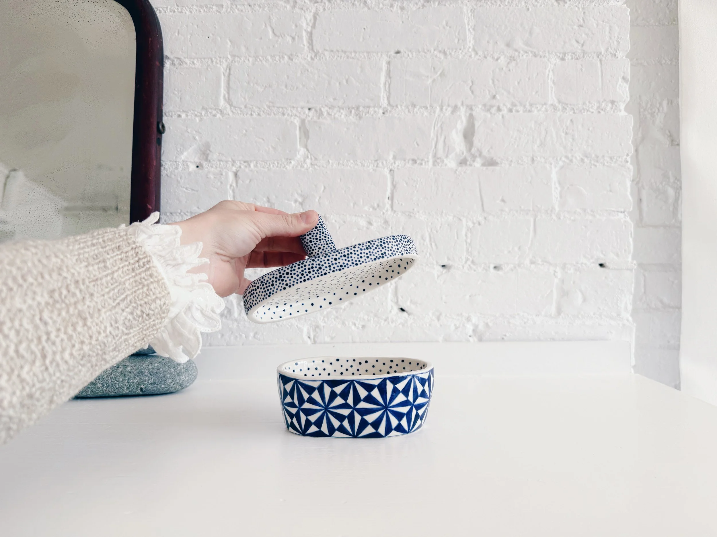 Blue and white, handmade ceramic jar.