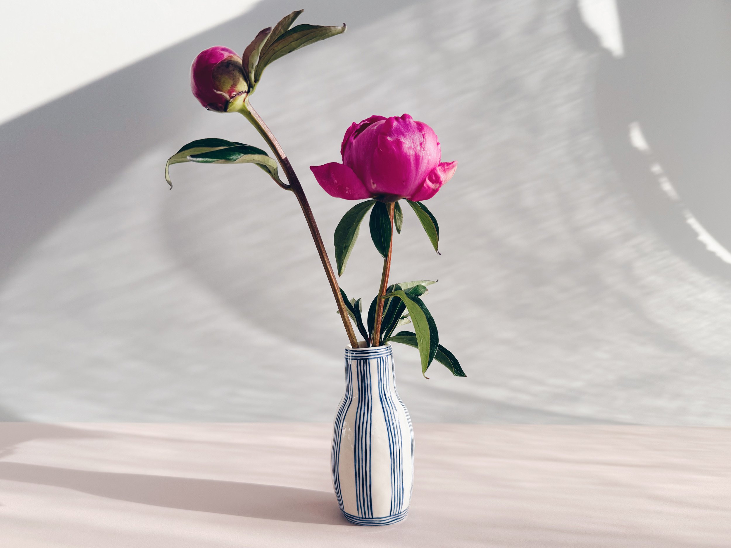 Blue and white, handmade ceramic vase.