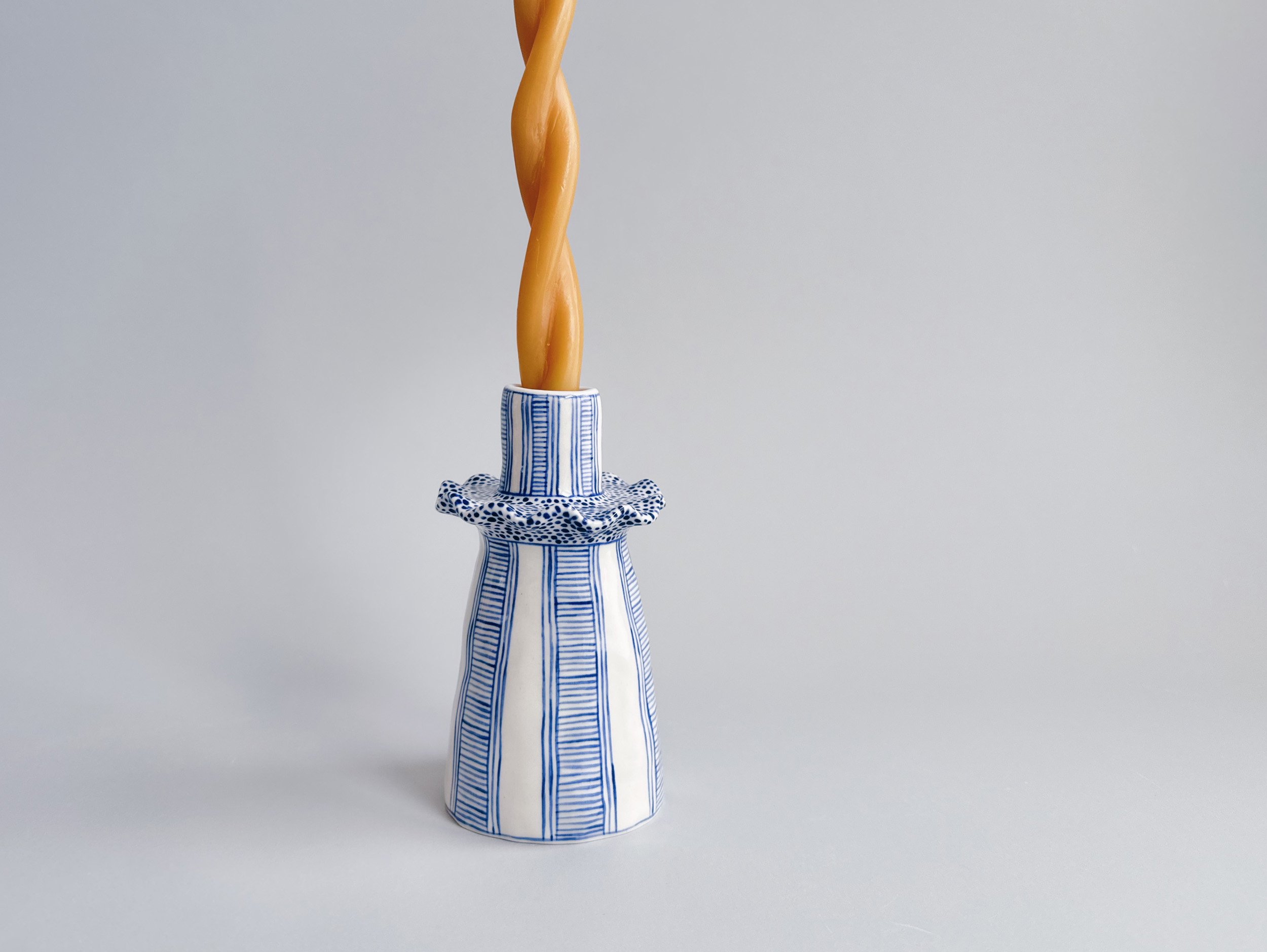 Blue and white, handmade ceramic candleholder.