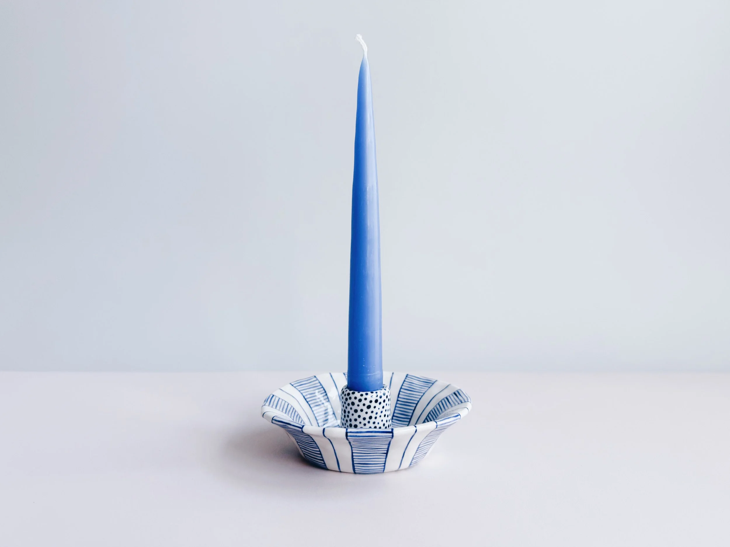 Blue and white, handmade ceramic candleholder.