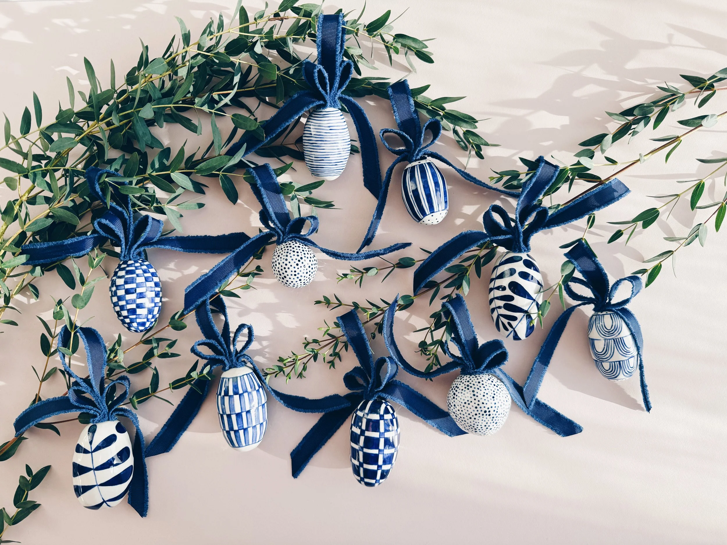 Blue and white, handmade ceramic ornament.