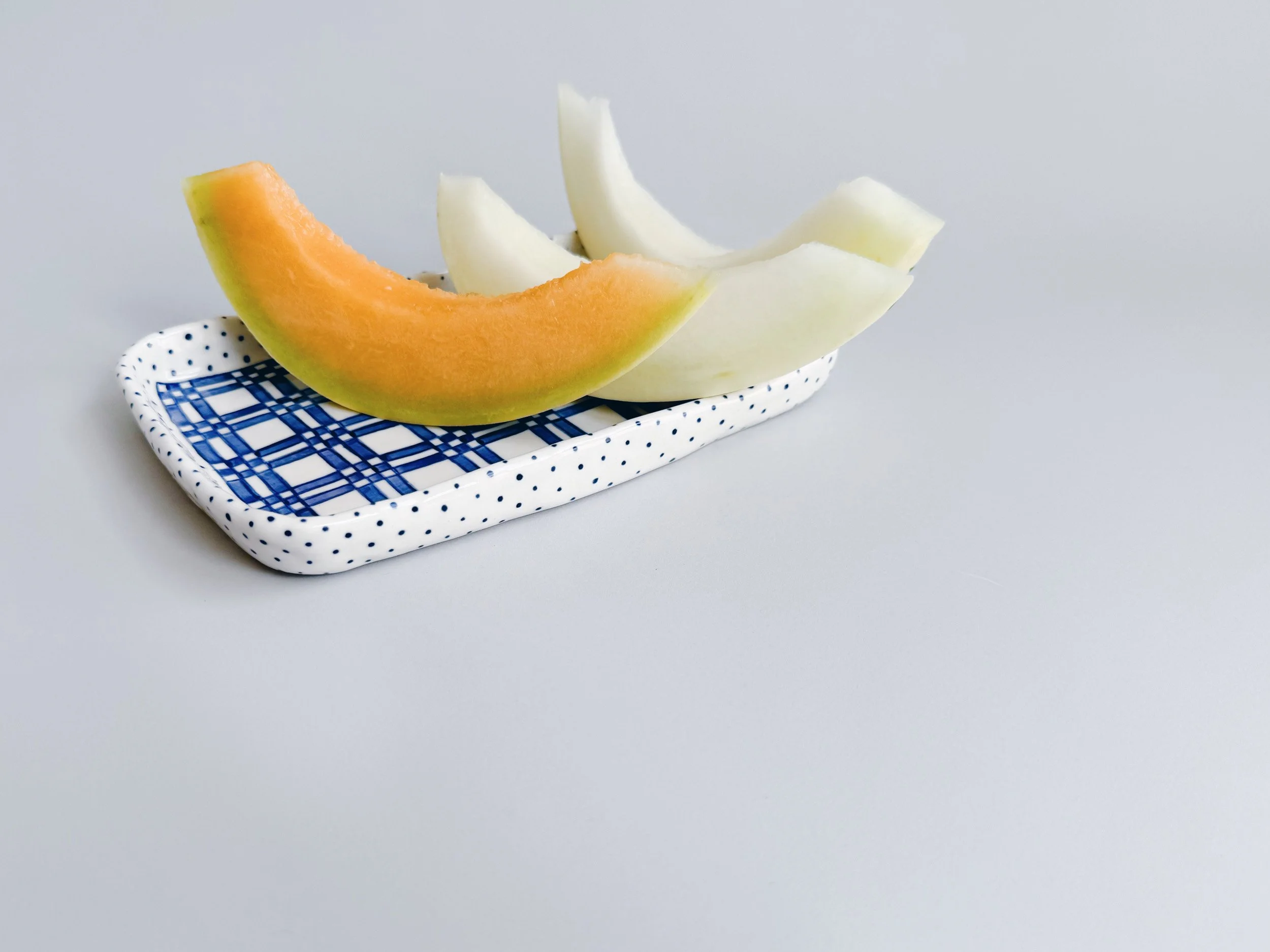 Blue and white, handmade ceramic plate.