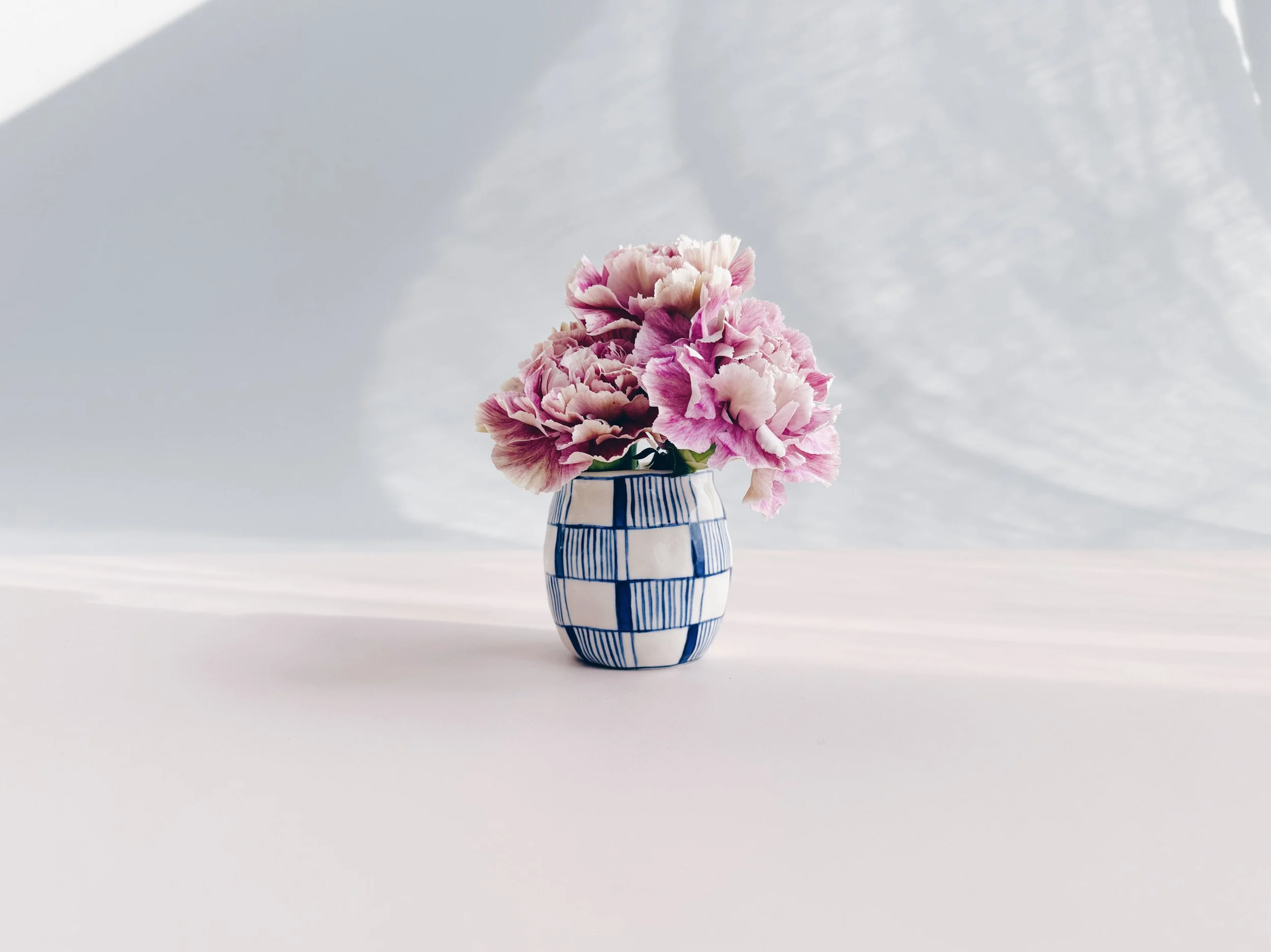 Blue and white, handmade ceramic vase.