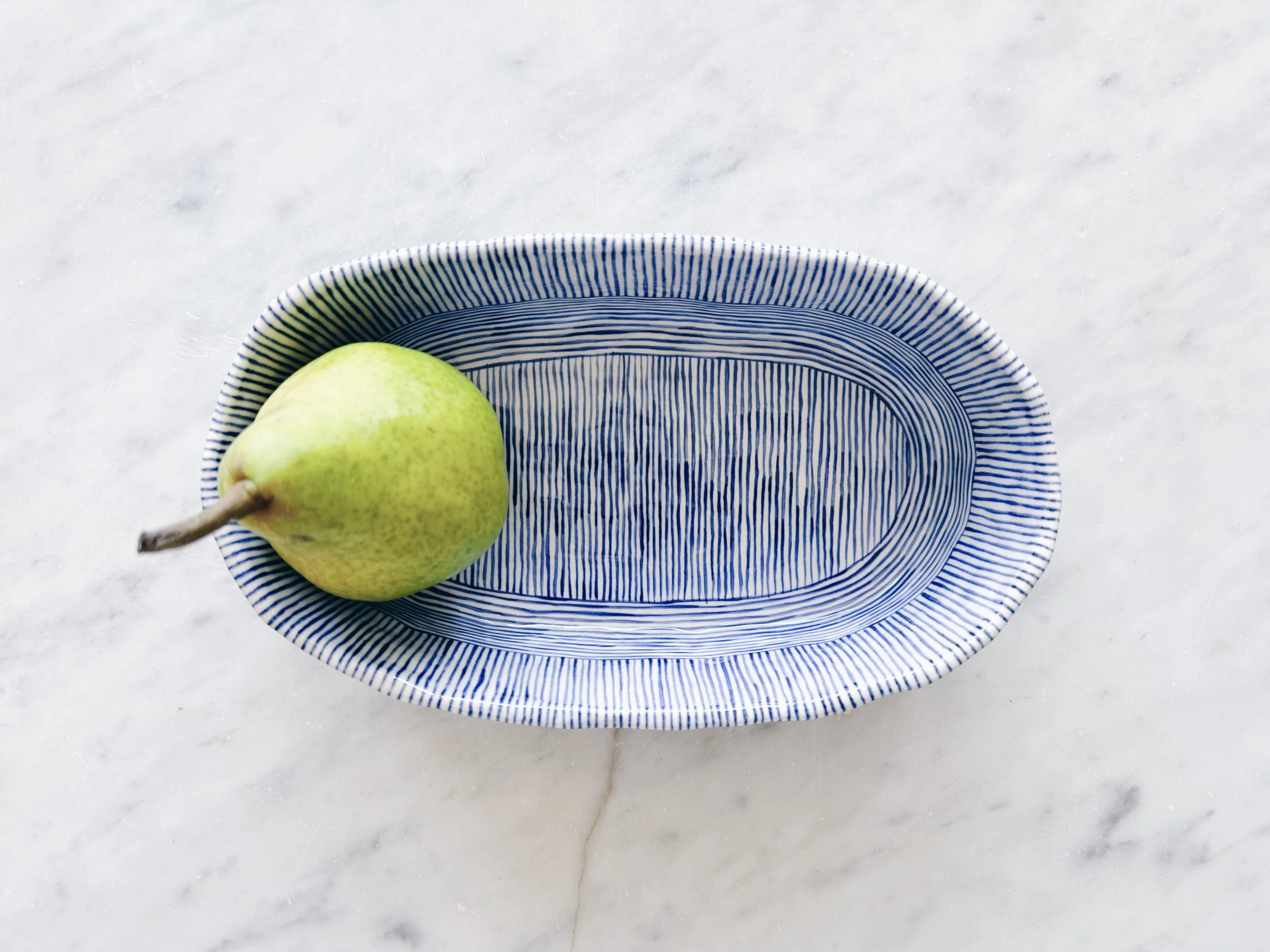 Blue and white, handmade ceramic dish.