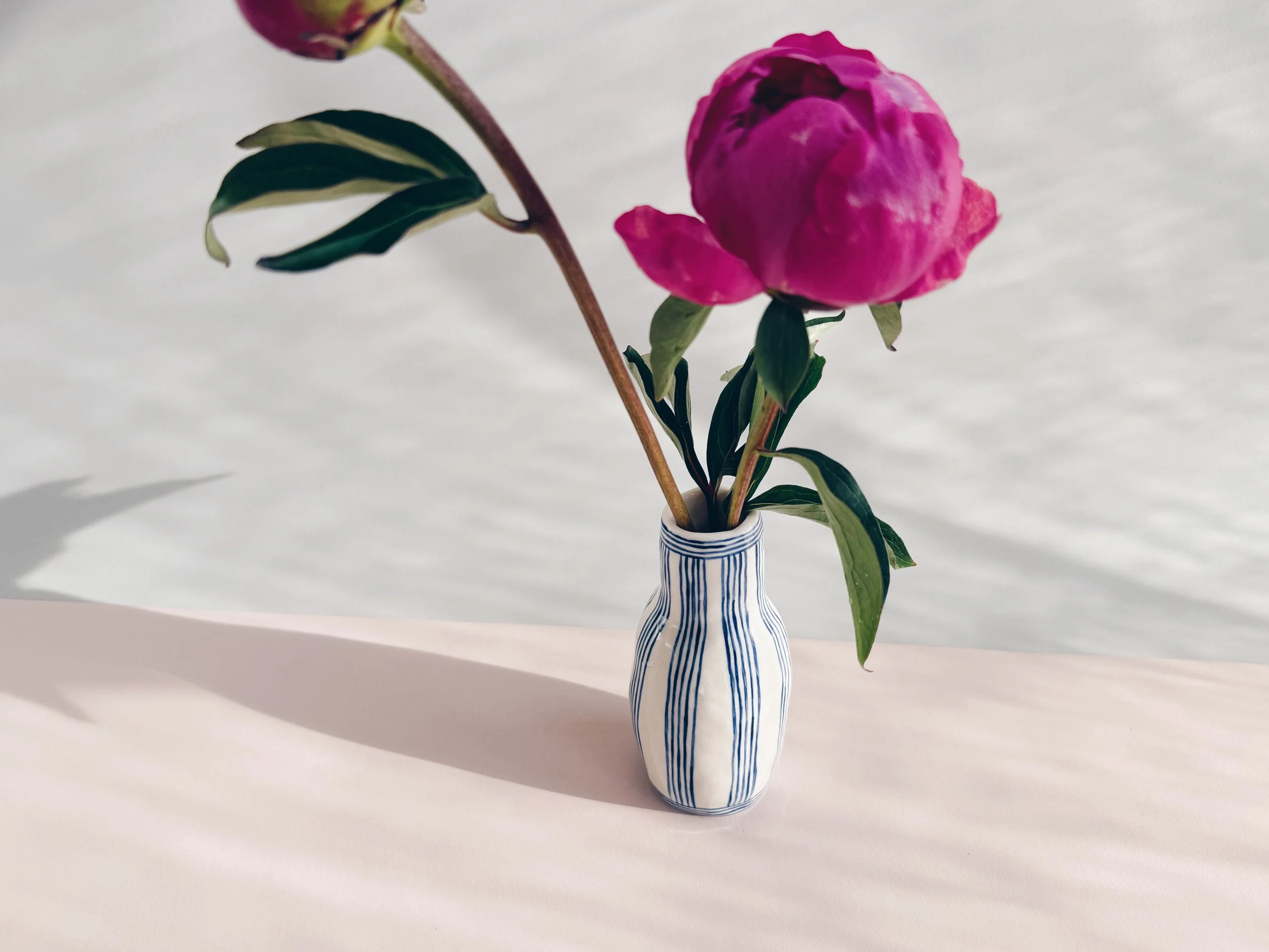 Blue and white, handmade ceramic vase.