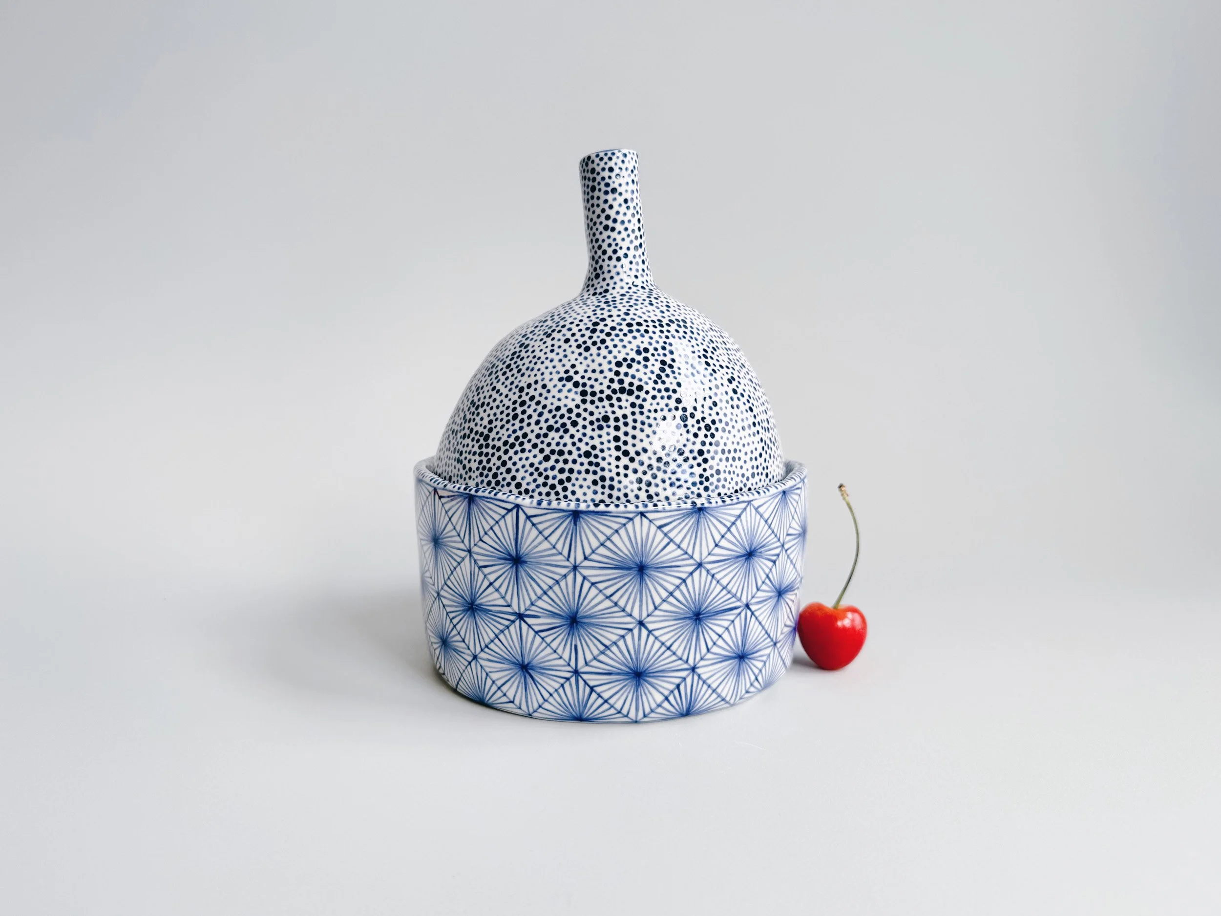 Blue and white, handmade ceramic jar.