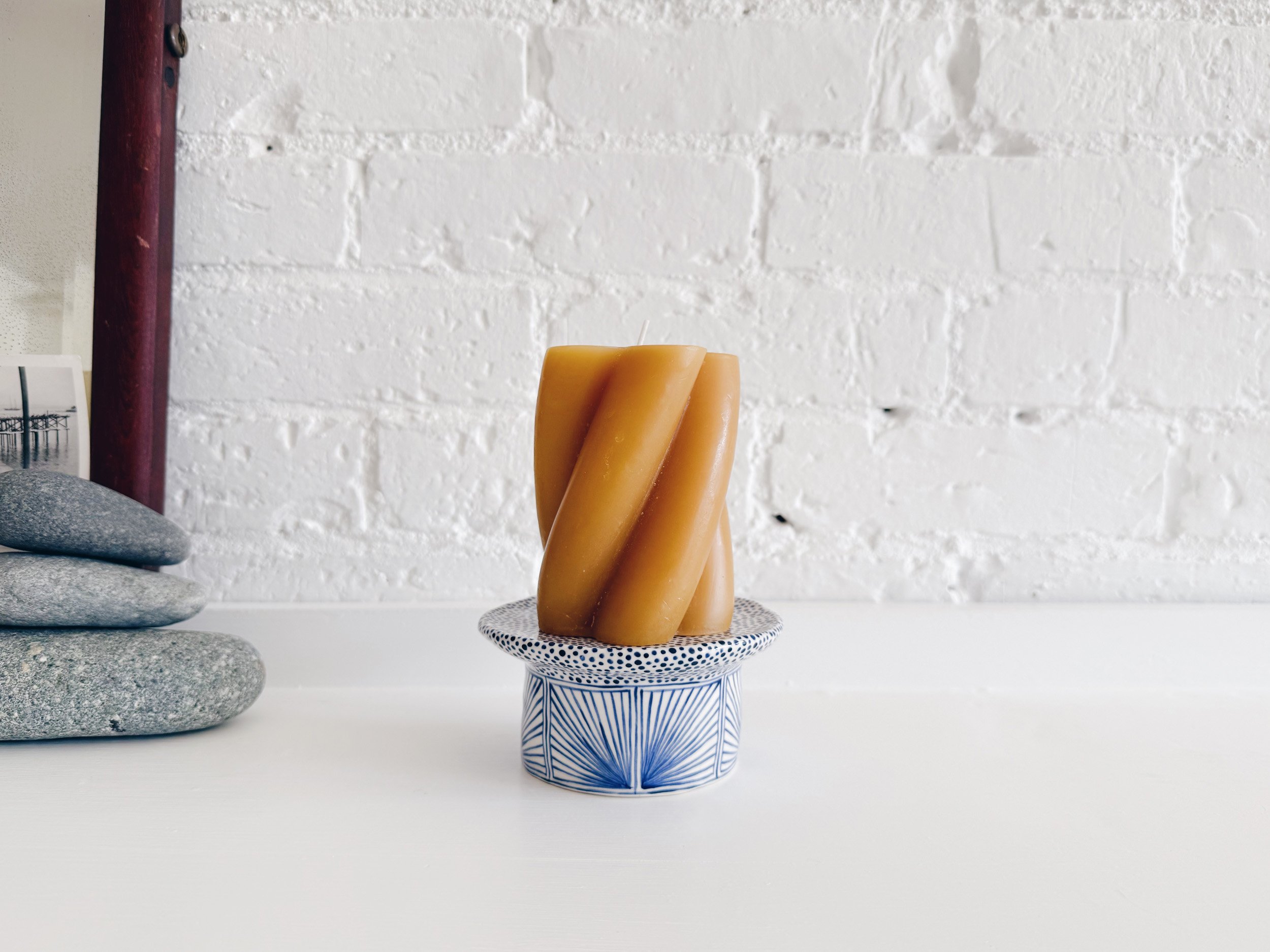 Blue and white, handmade ceramic raised plate.
