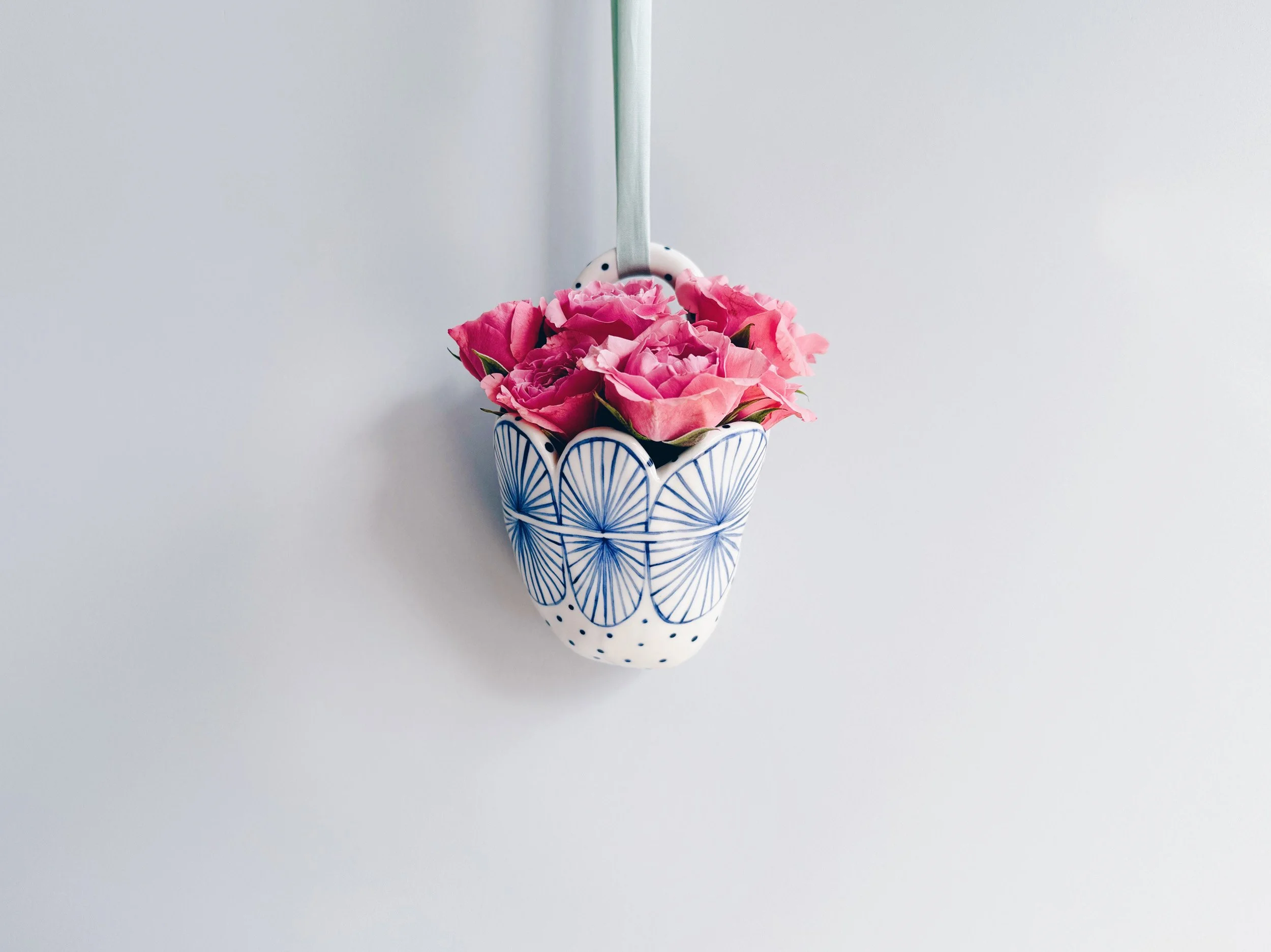 Blue and white, handmade ceramic vessel.