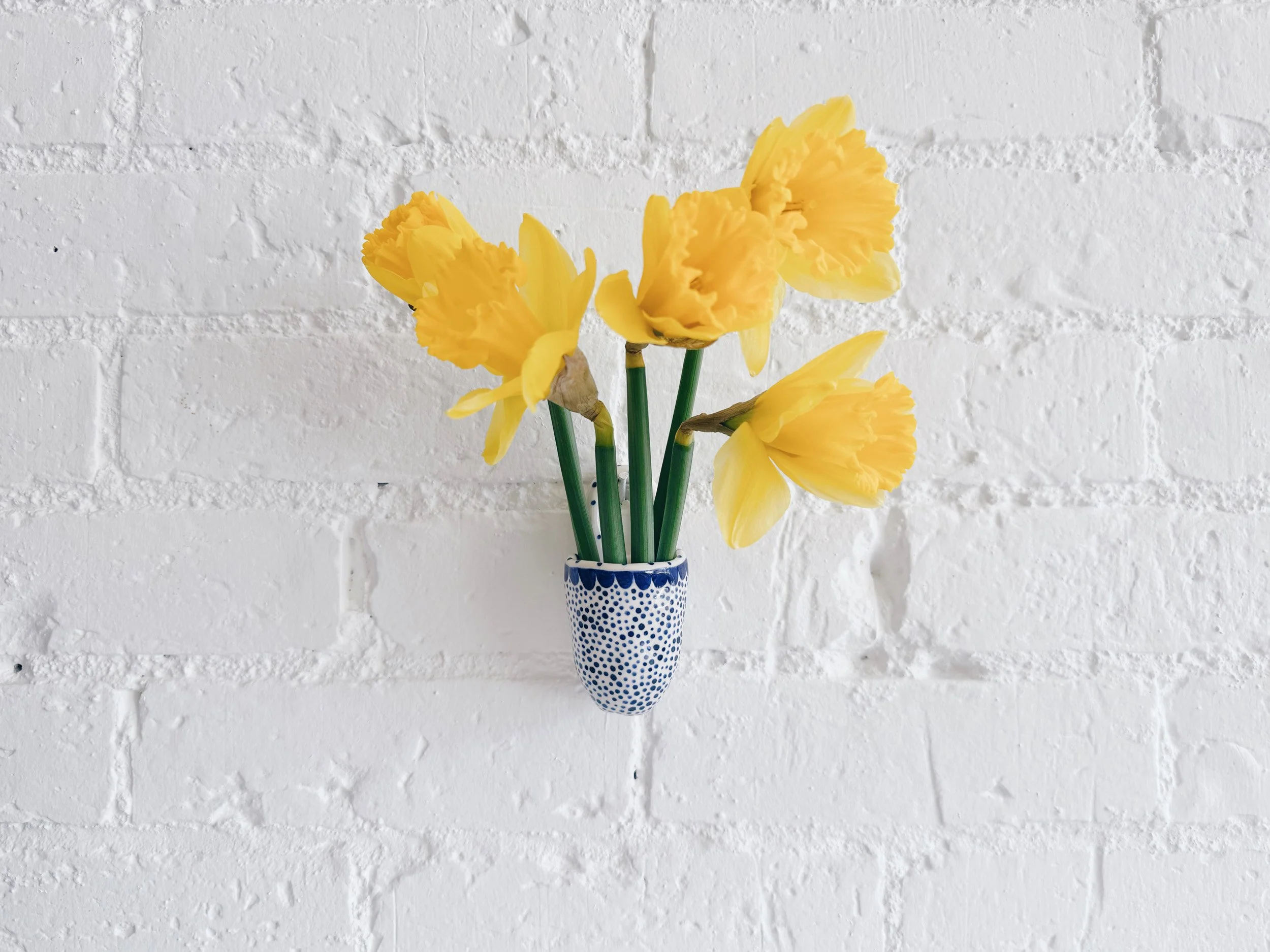 Blue and white, handmade ceramic vessel.