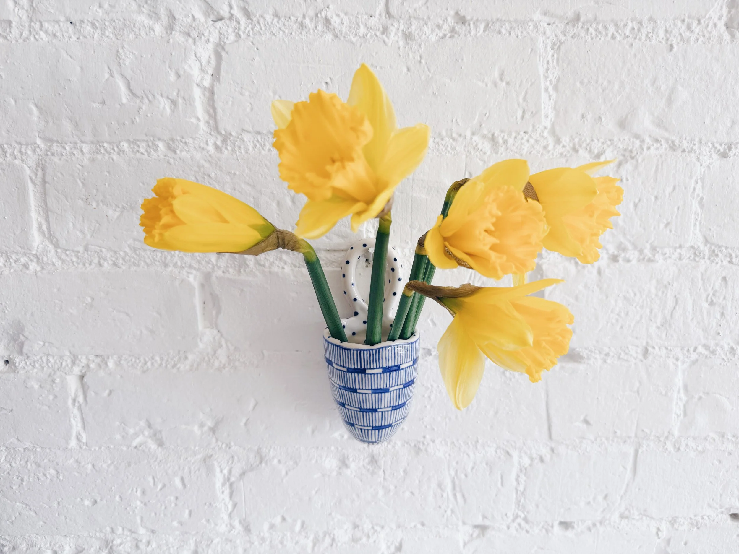 Blue and white, handmade ceramic vessel.