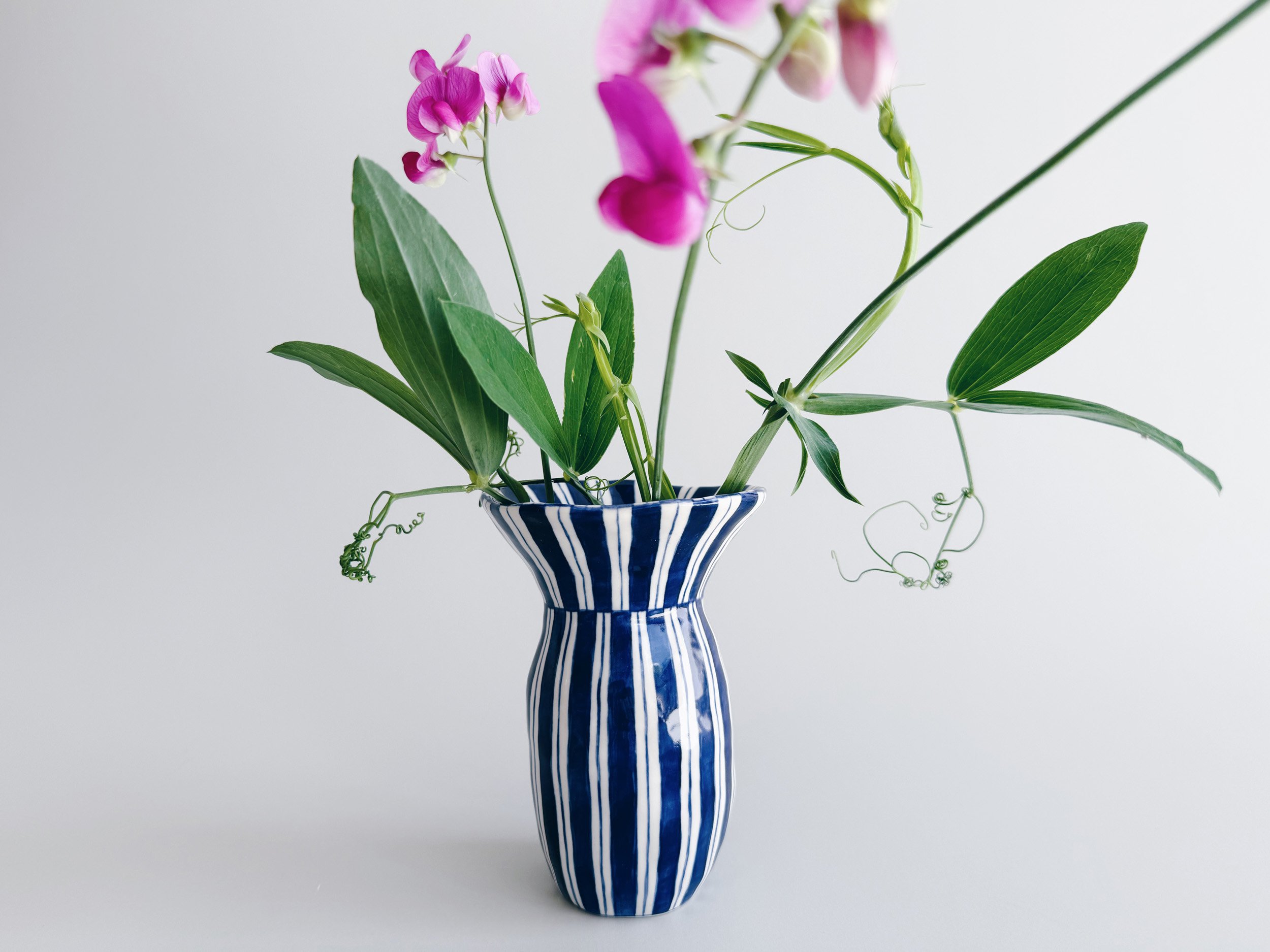 Blue and white, handmade ceramic vase.