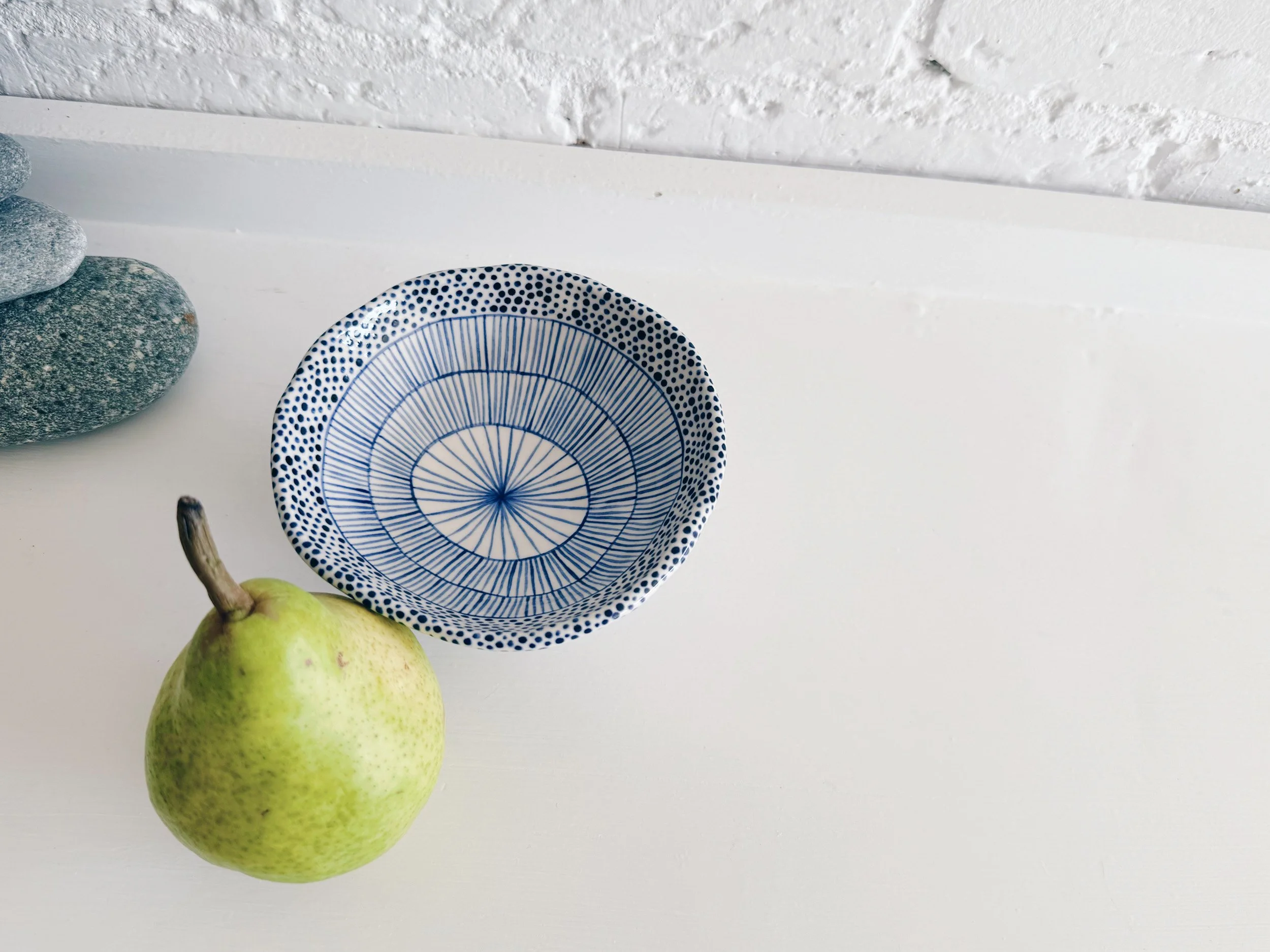 Blue and white, handmade ceramic bowl.