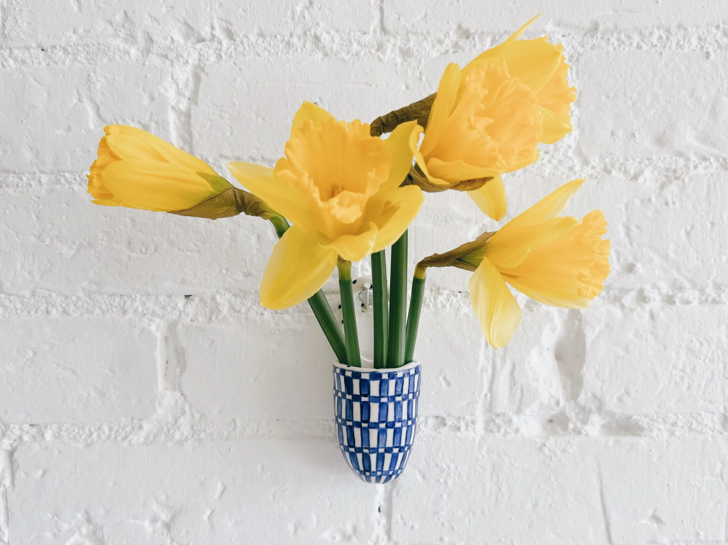 Blue and white, handmade ceramic vessel.