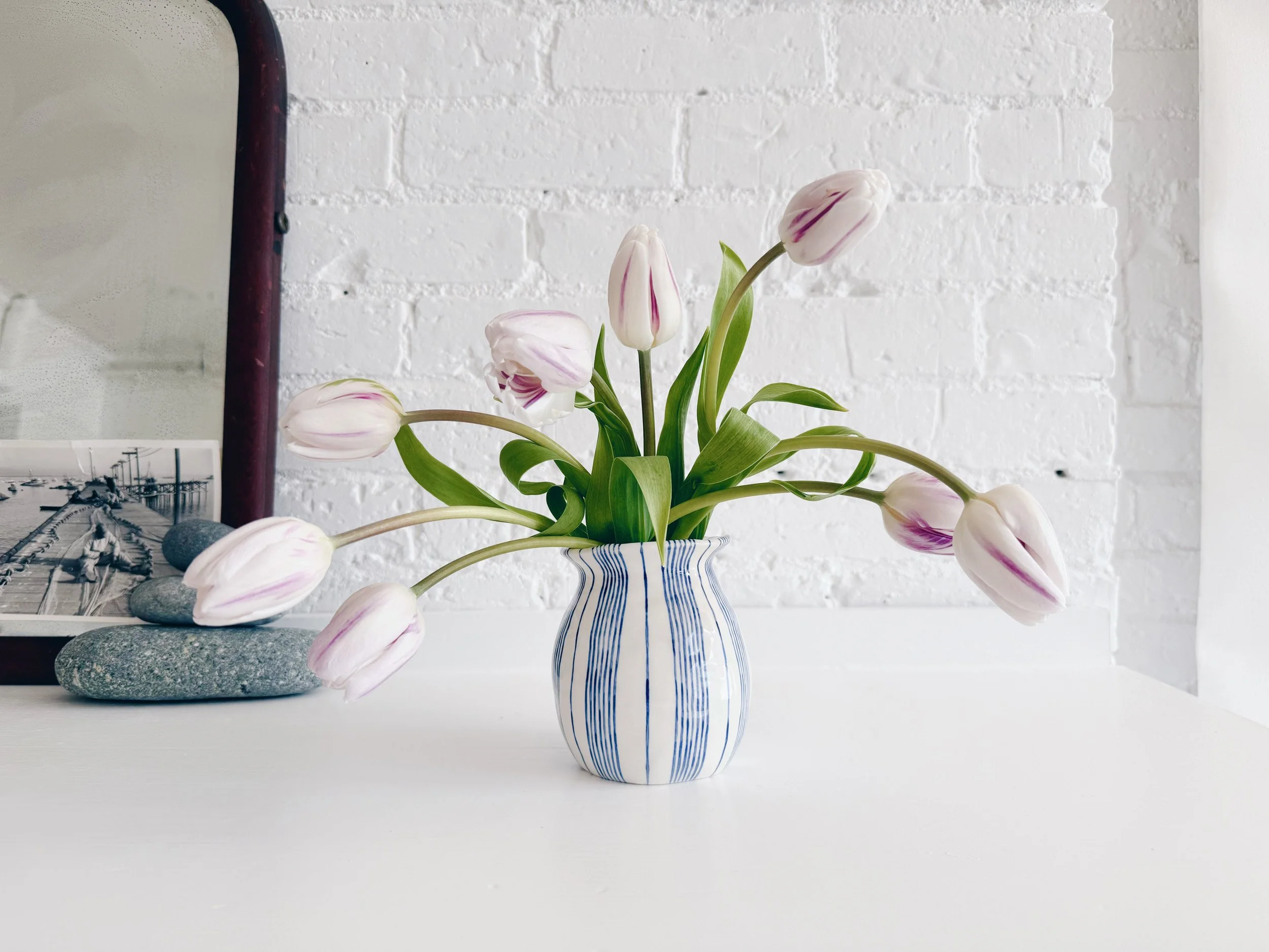Blue and white, handmade ceramic vase.
