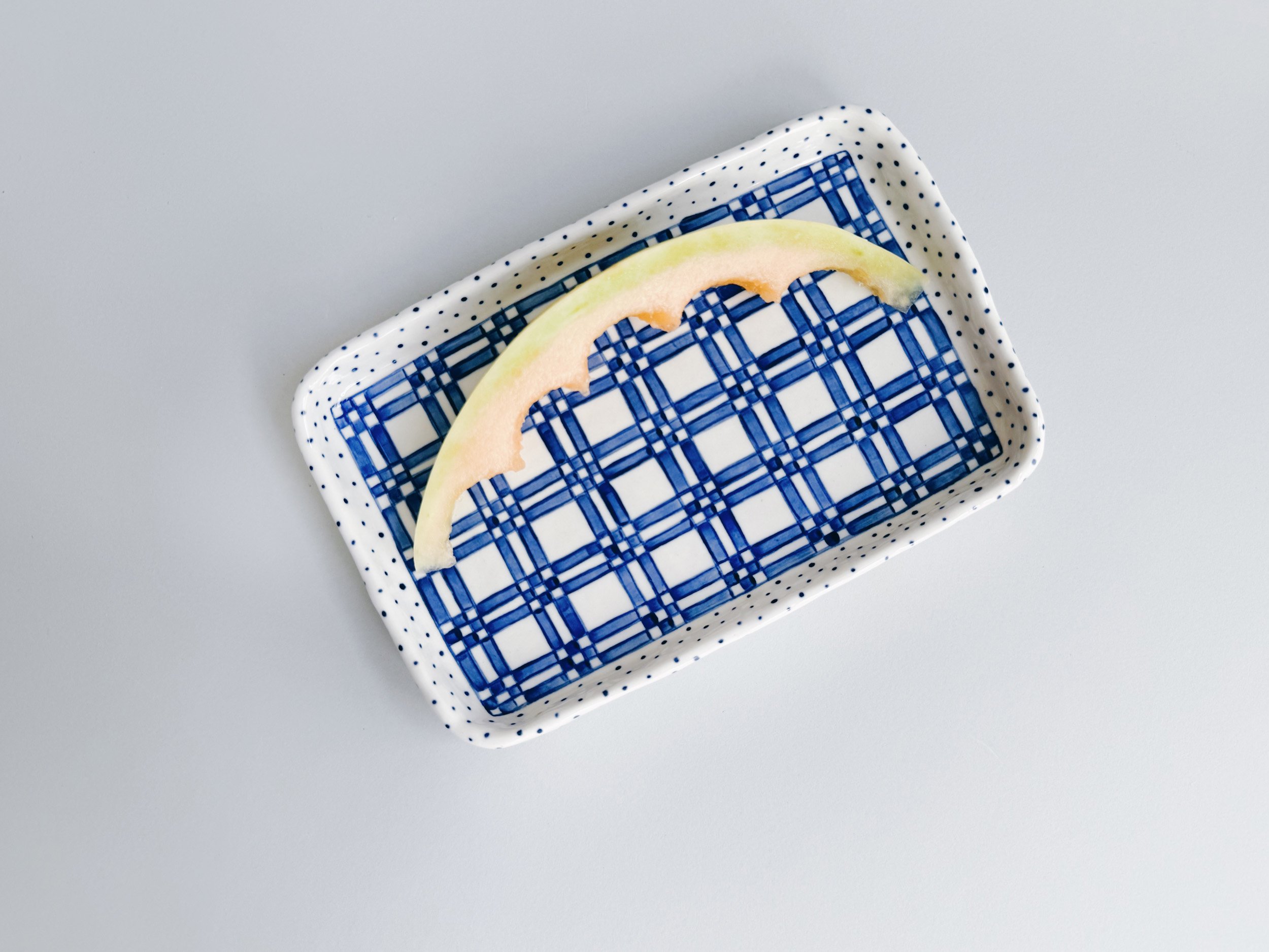 Blue and white, handmade ceramic plate.
