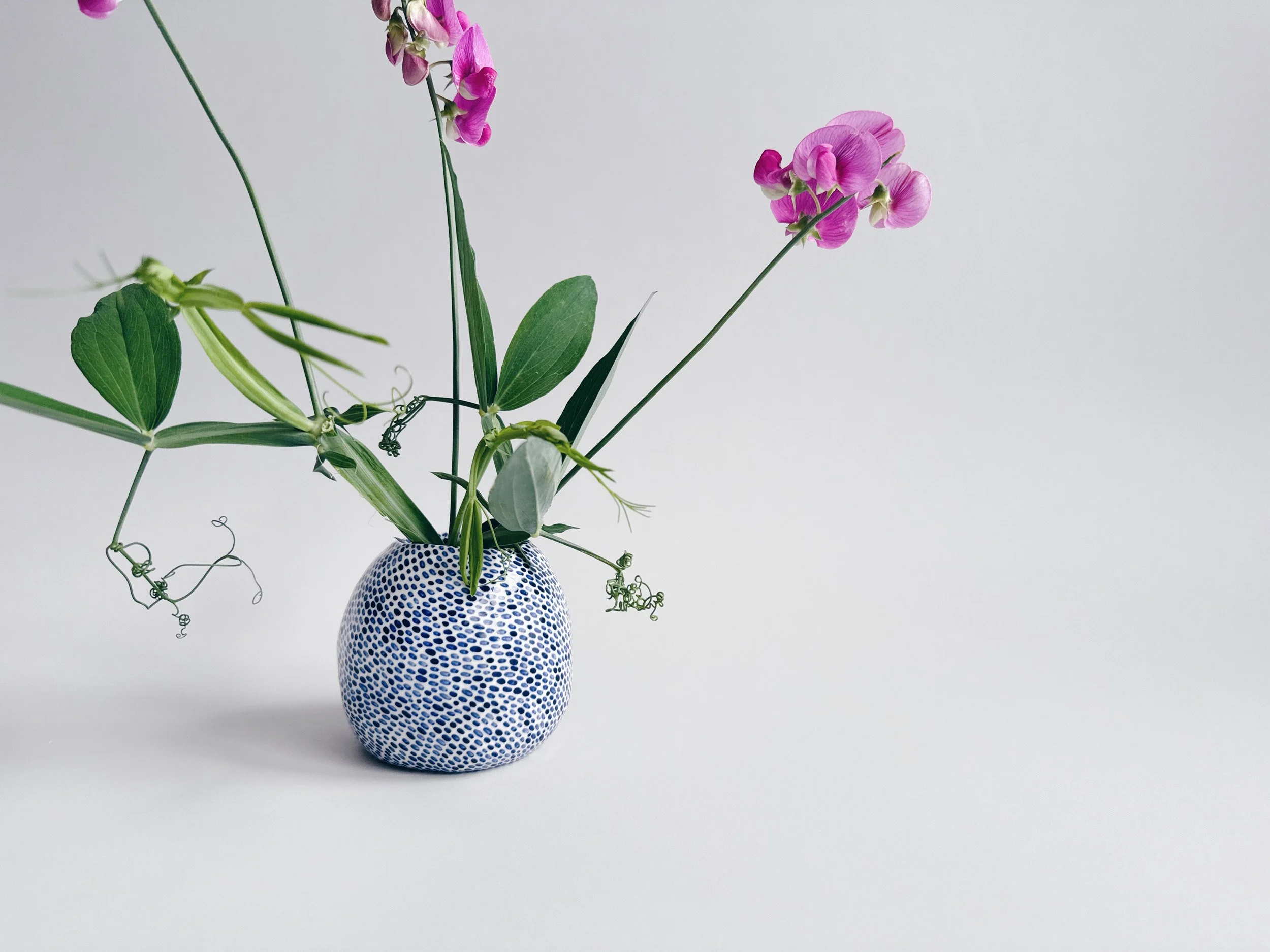 Blue and white, handmade ceramic vase.