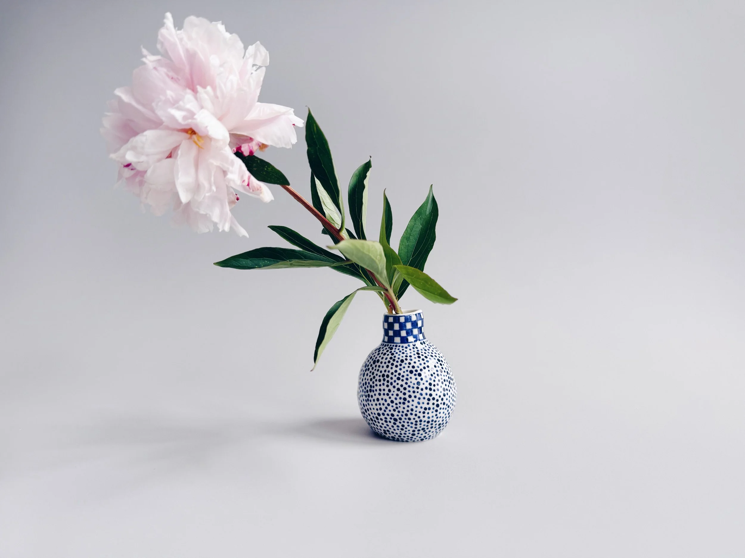 Blue and white, handmade ceramic vase.