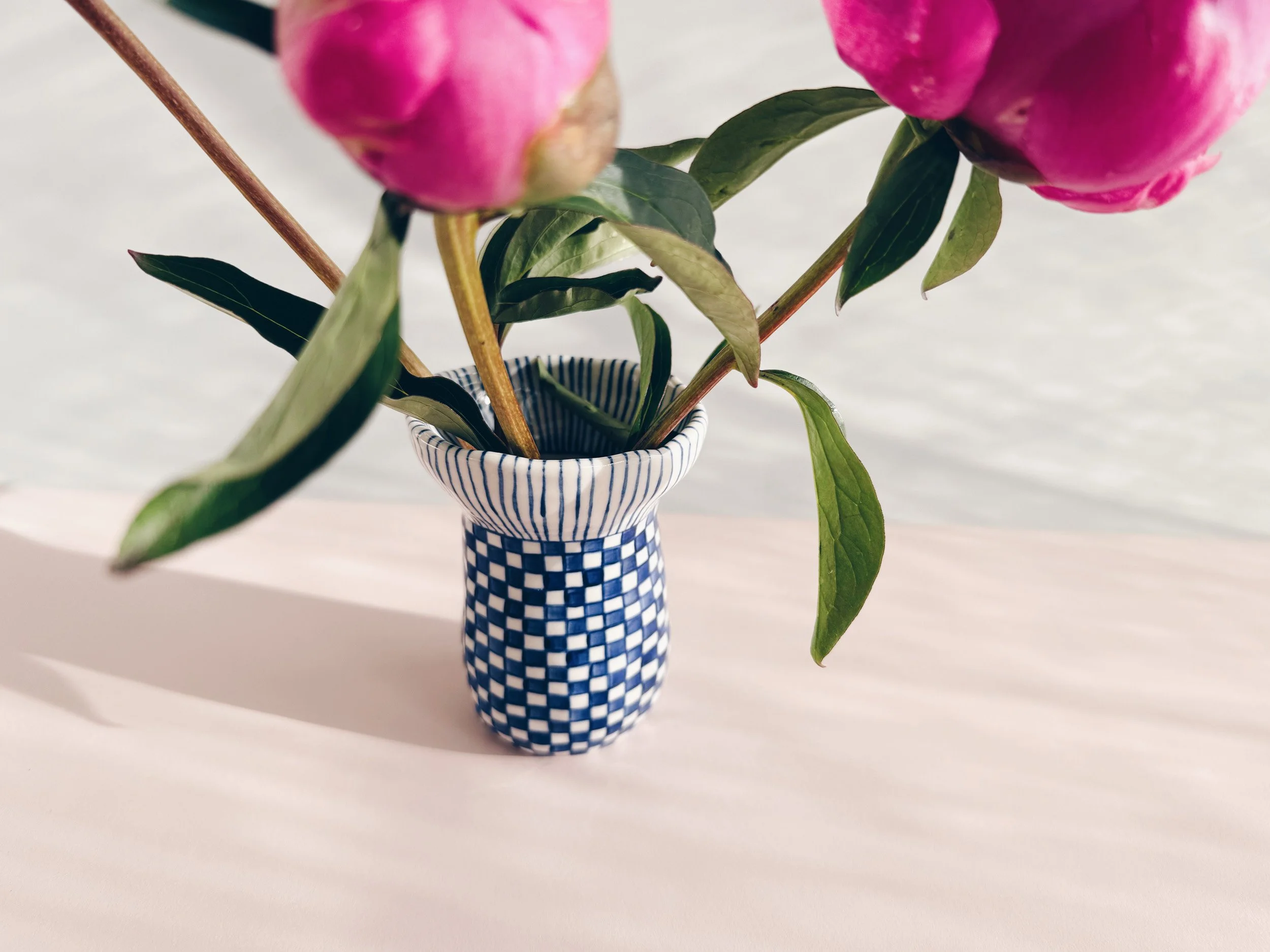 Blue and white, handmade ceramic vase.