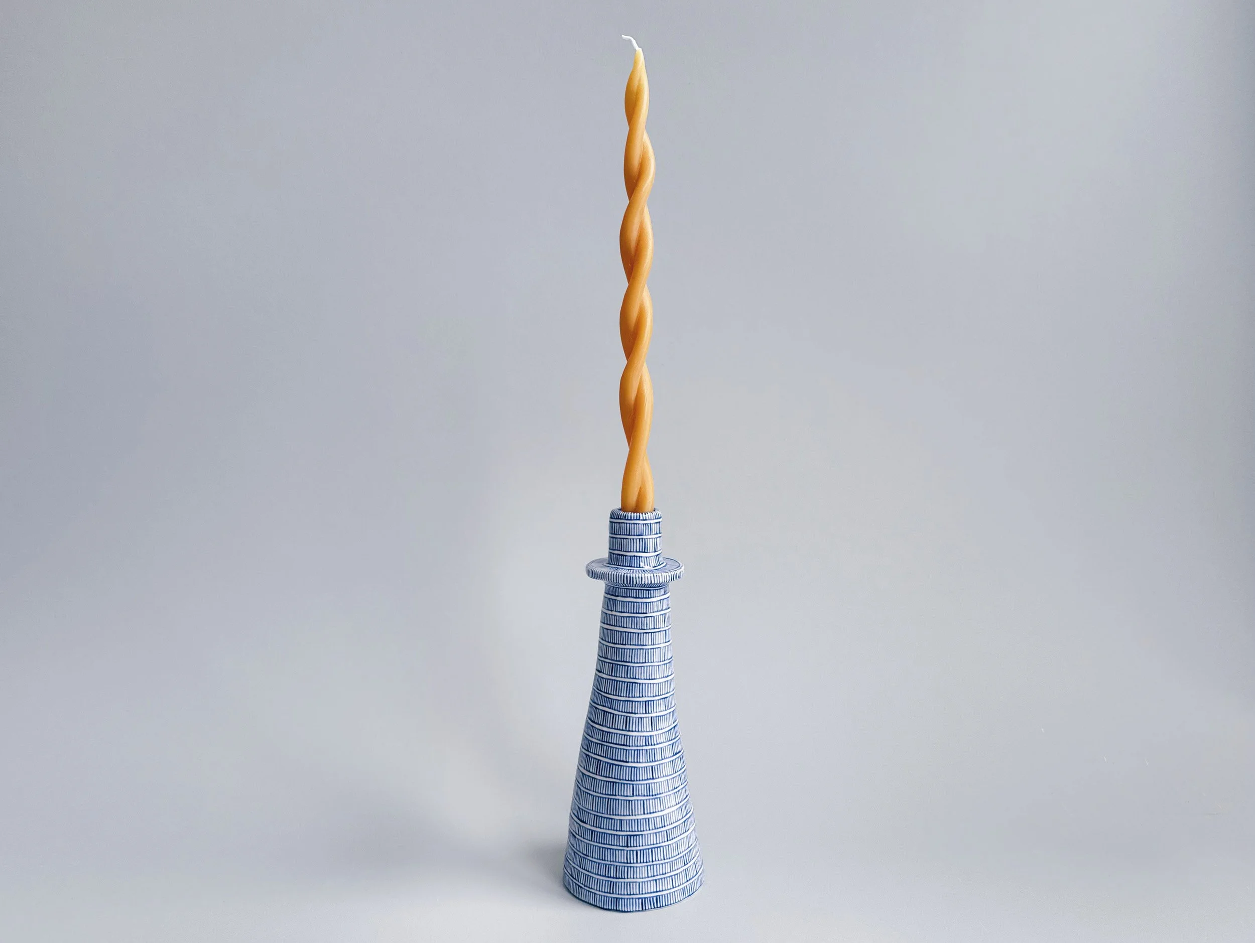 Blue and white, handmade ceramic candleholder.