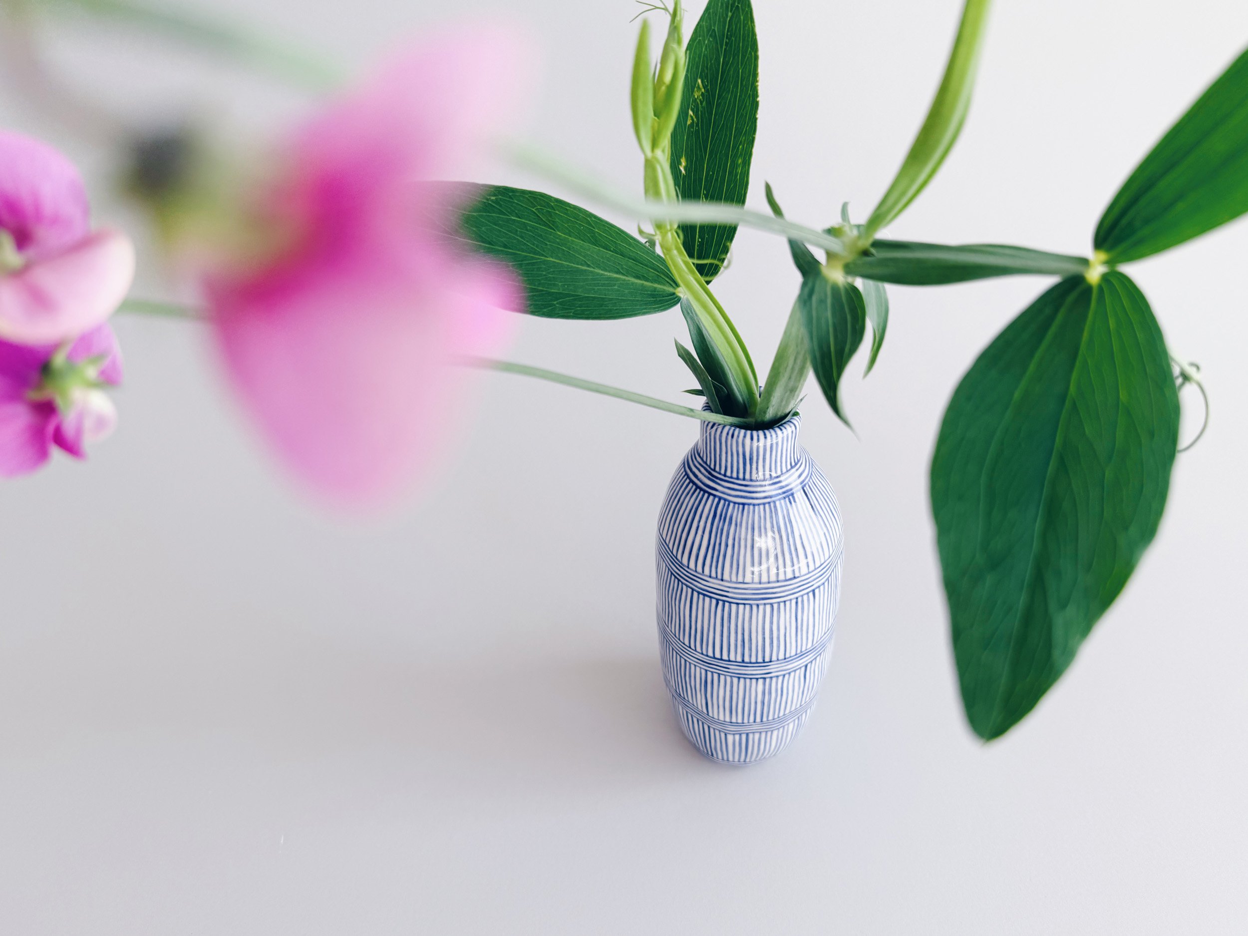 Blue and white, handmade ceramic vase.