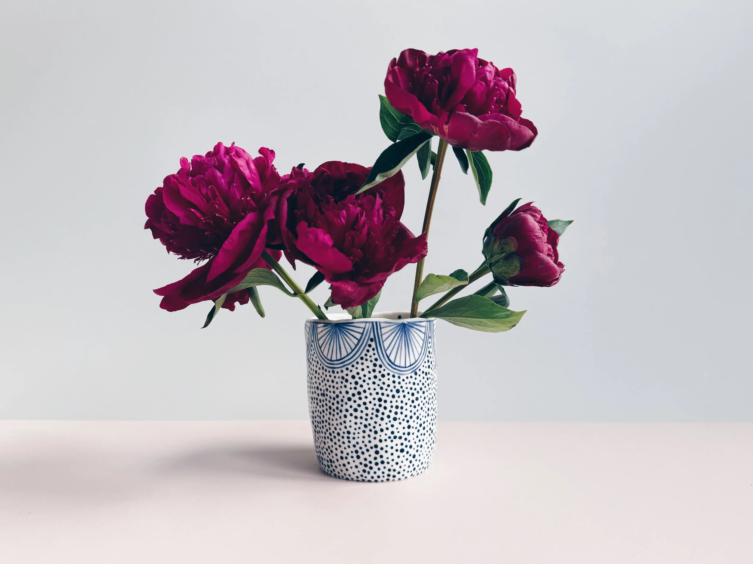 Blue and white, handmade ceramic cup.