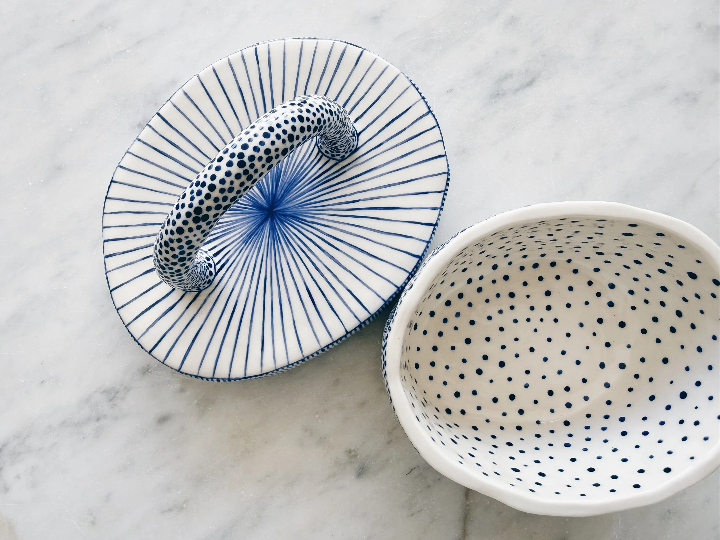 Blue and white, handmade ceramic jar.