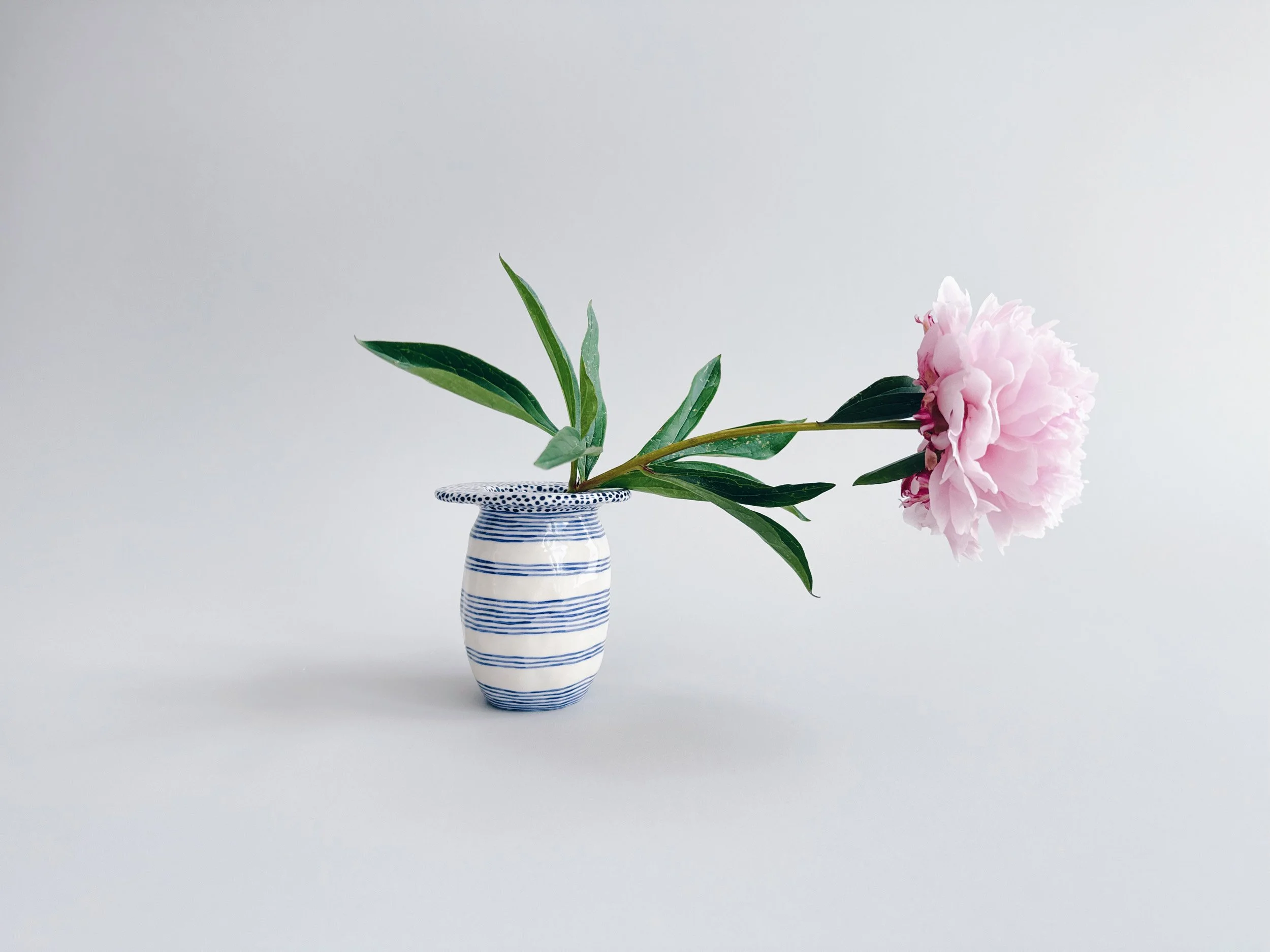 Blue and white, handmade ceramic vase.