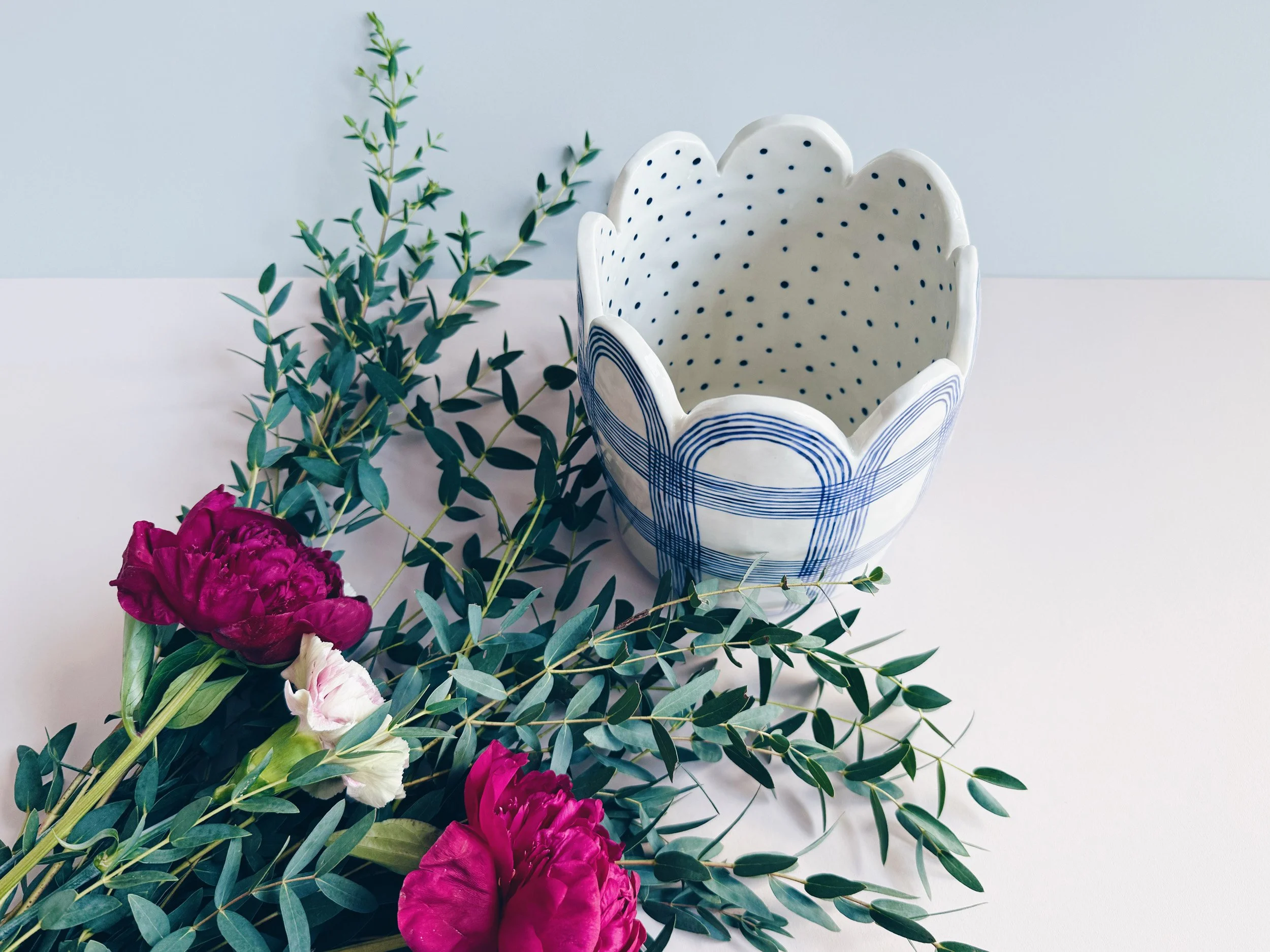 Blue and white, handmade ceramic vase.