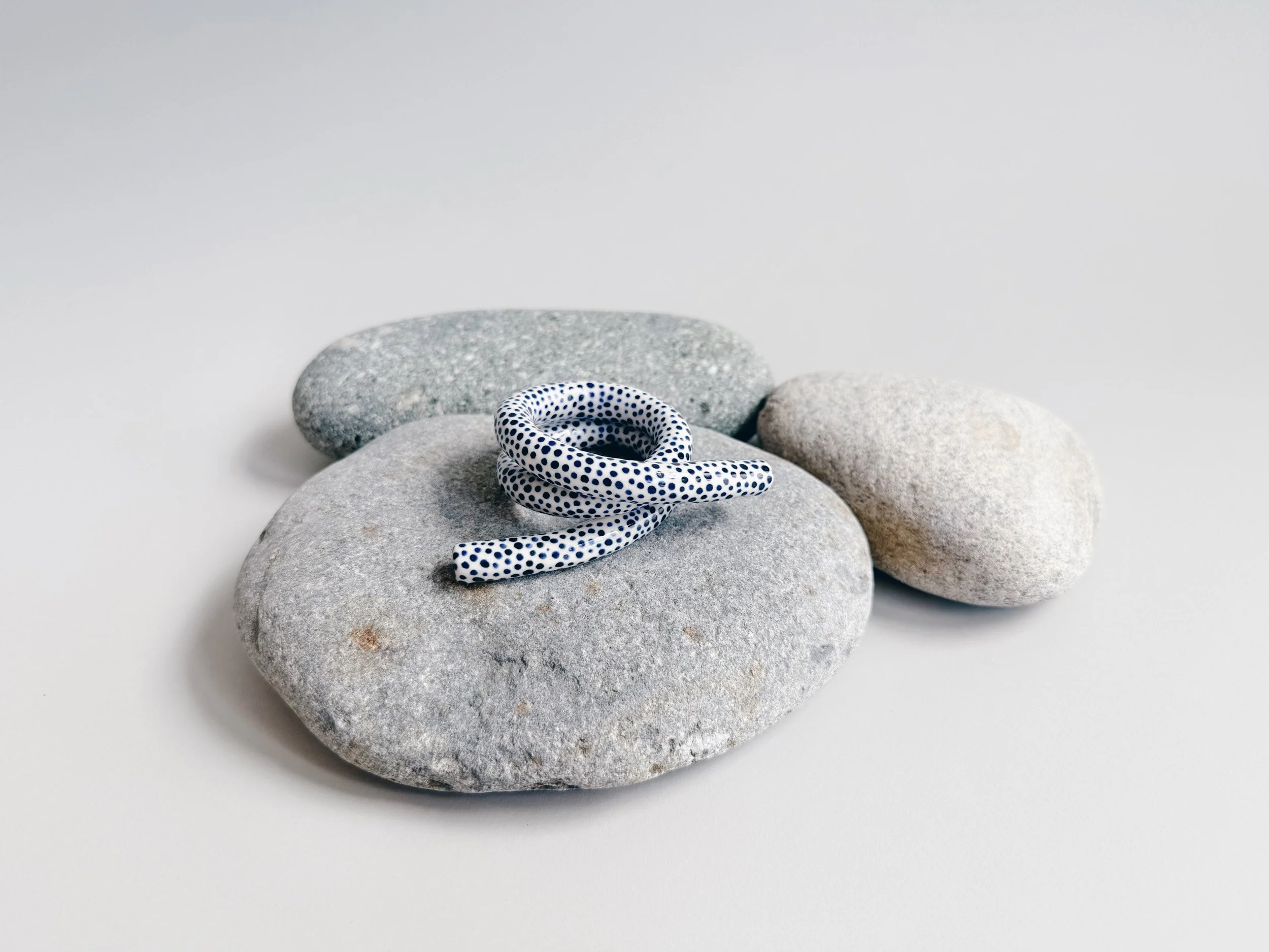 Blue and white, handmade ceramic squiggle
