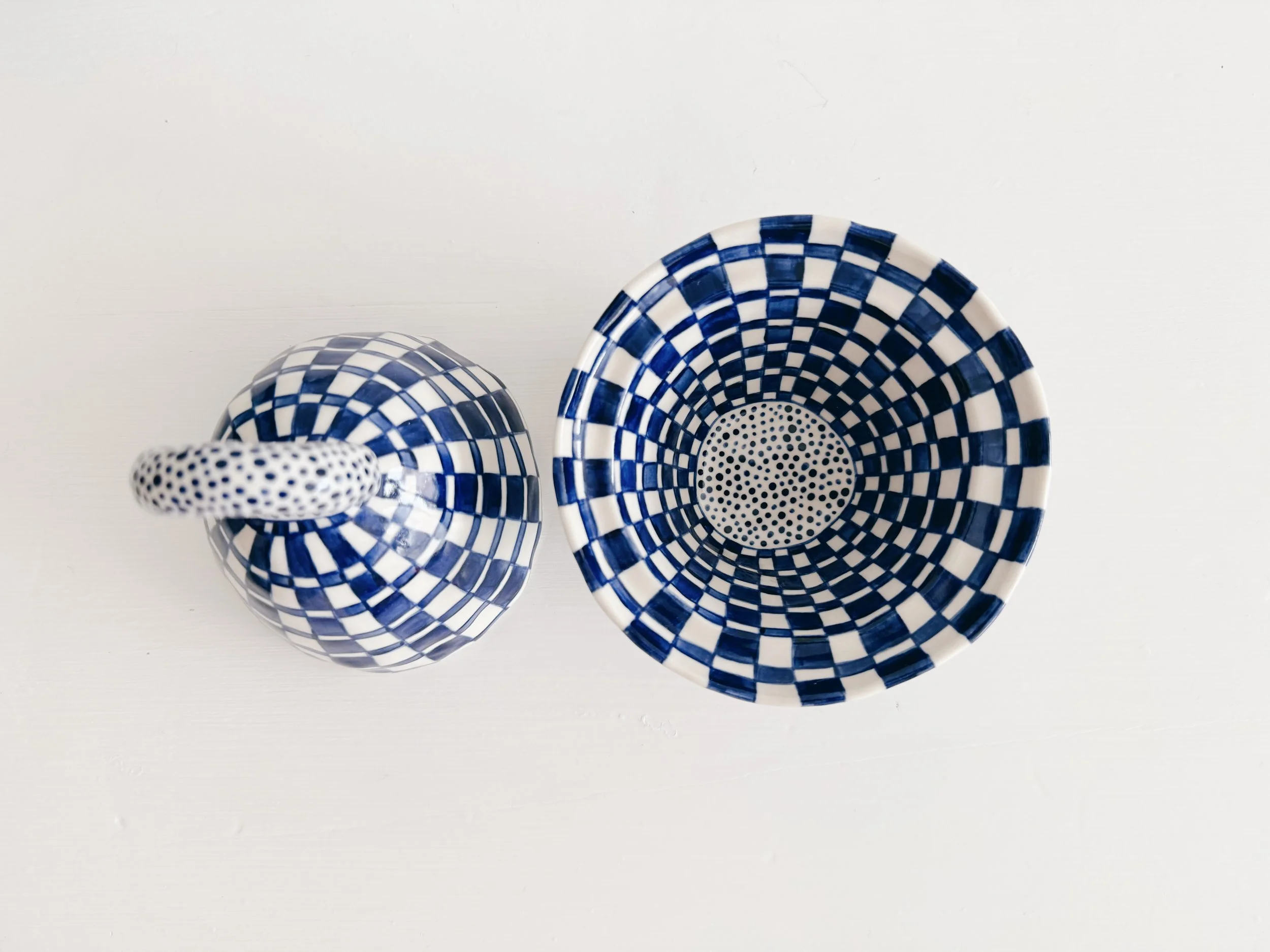 Blue and white, handmade ceramic jar.