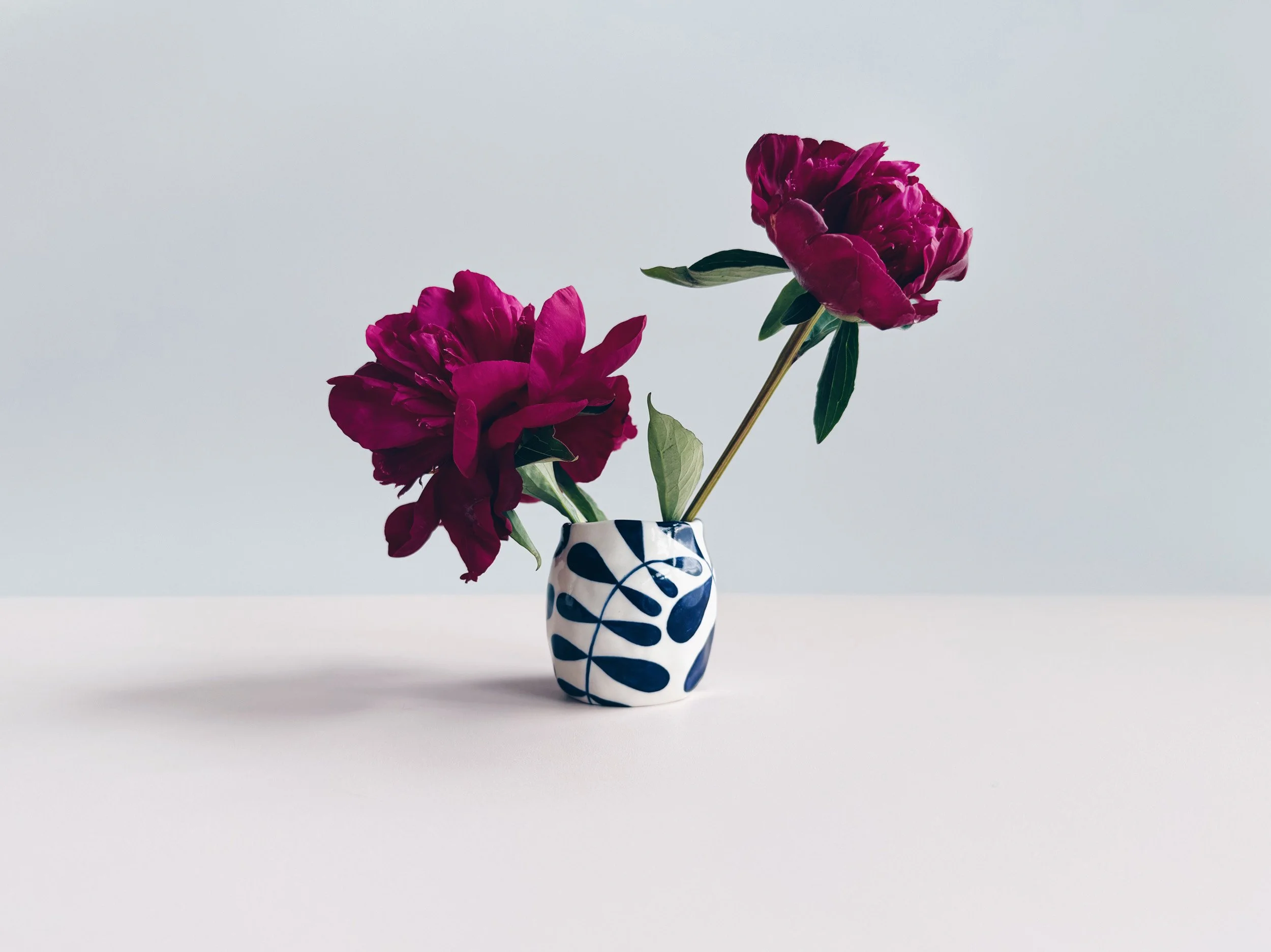 Blue and white, handmade ceramic vase.