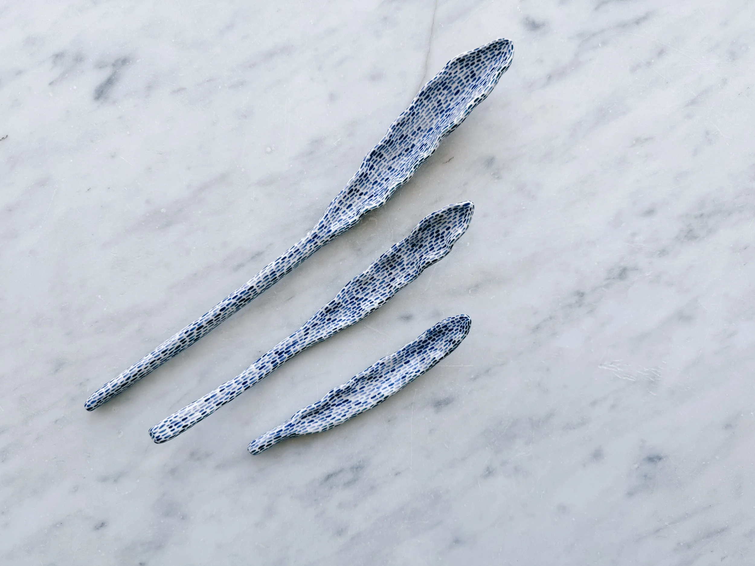 Blue and white, handmade ceramic sculpture.