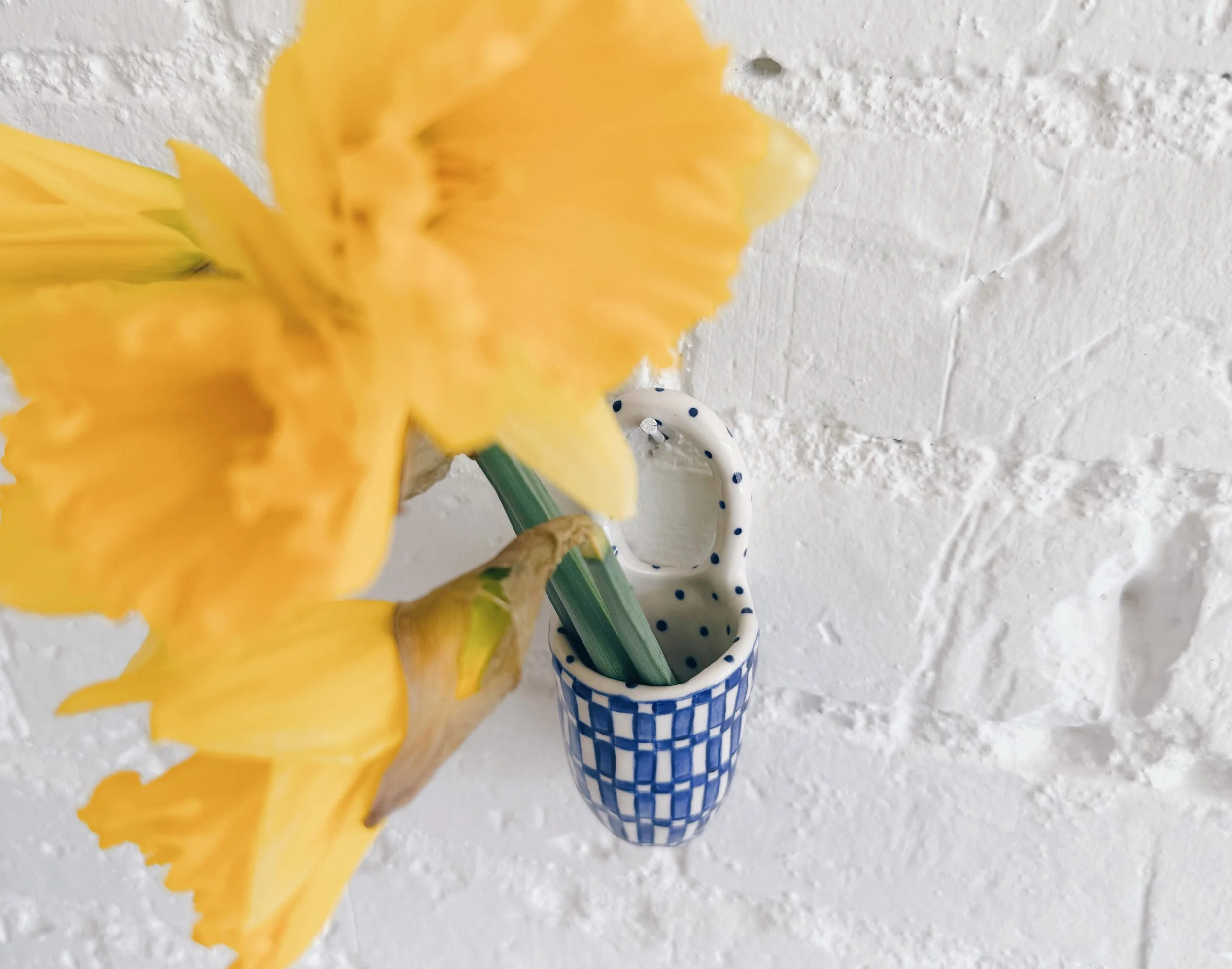 Blue and white, handmade ceramic vessel.
