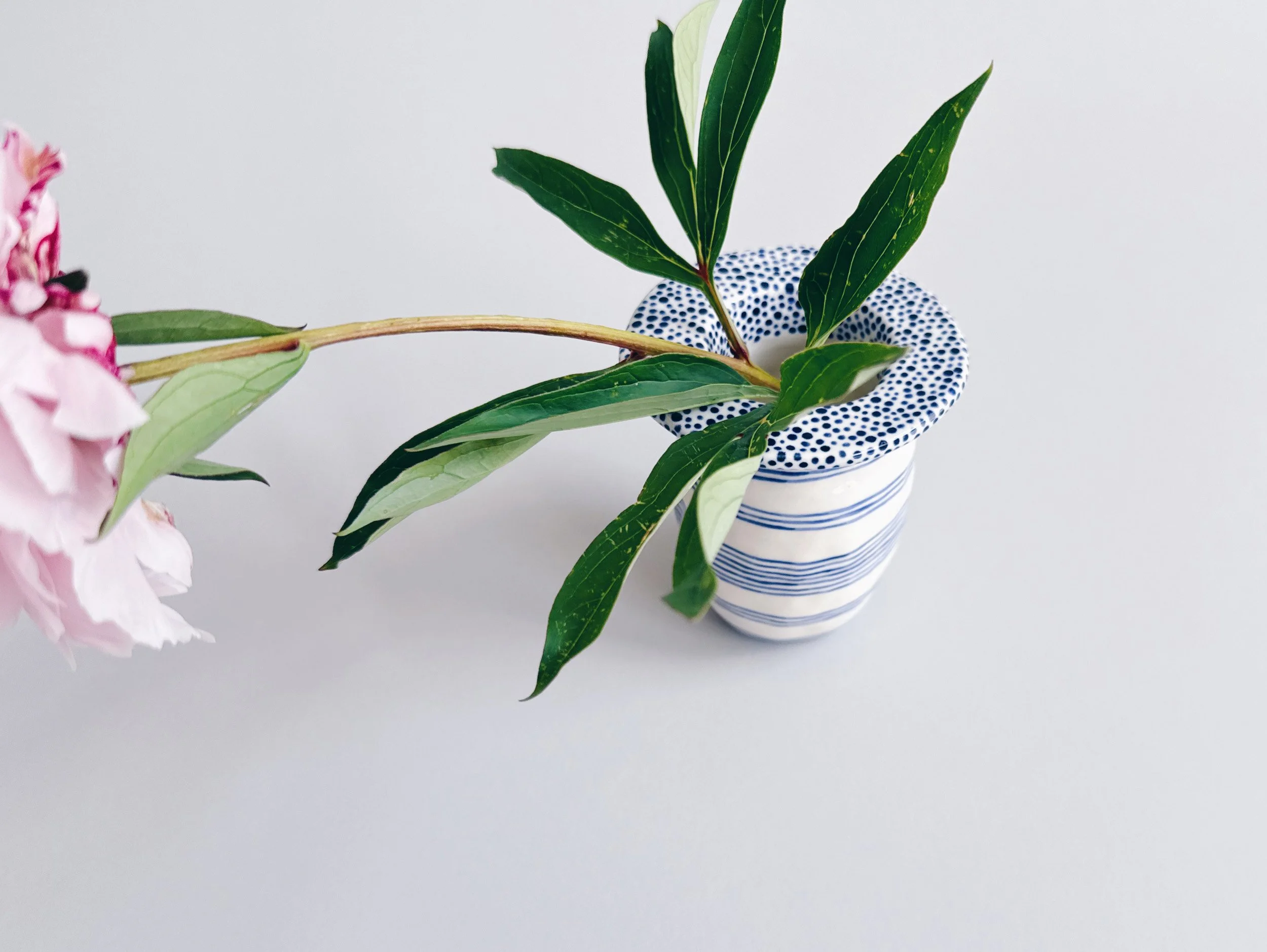Blue and white, handmade ceramic vase.