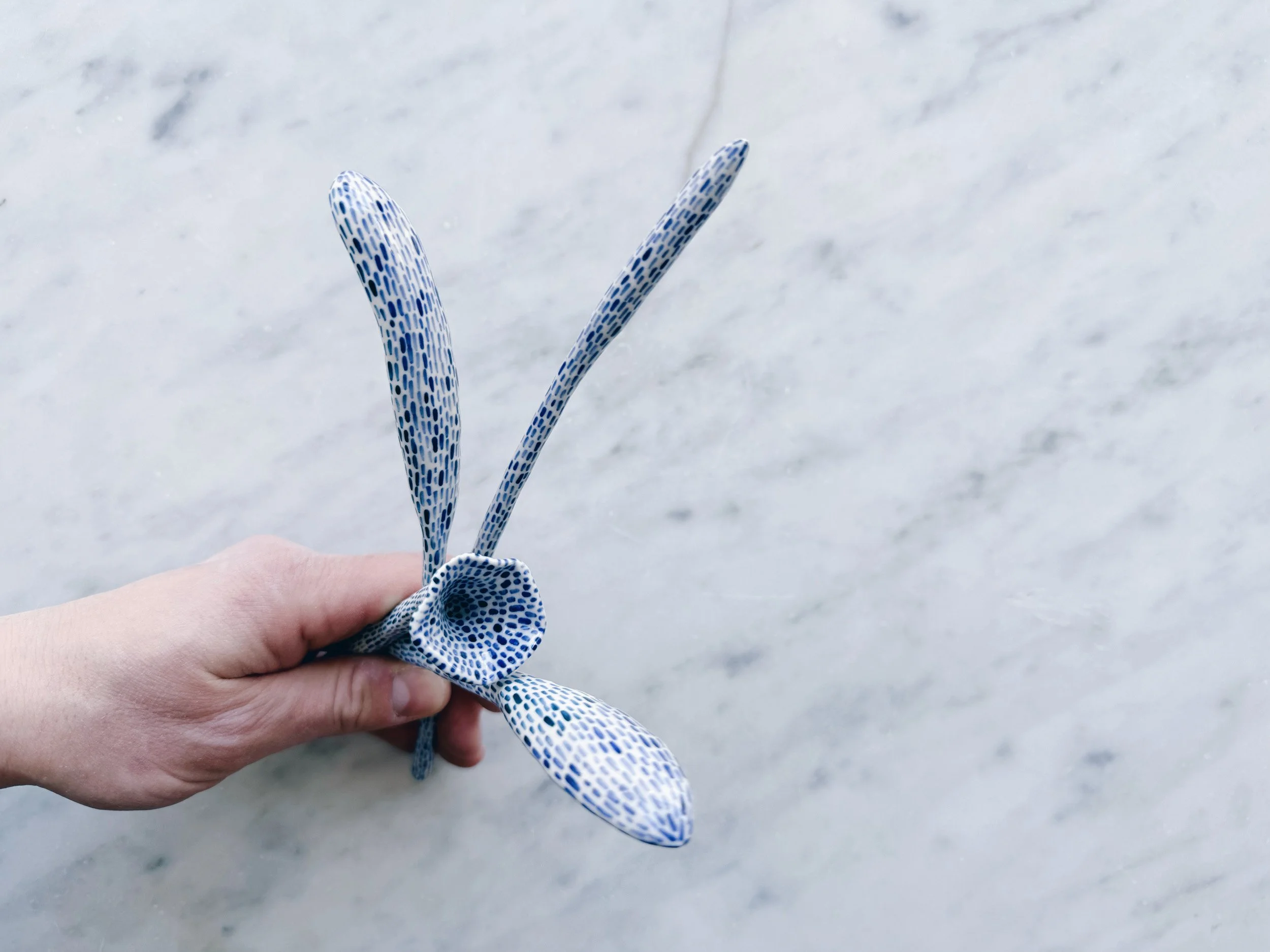 Blue and white, handmade ceramic sculpture.