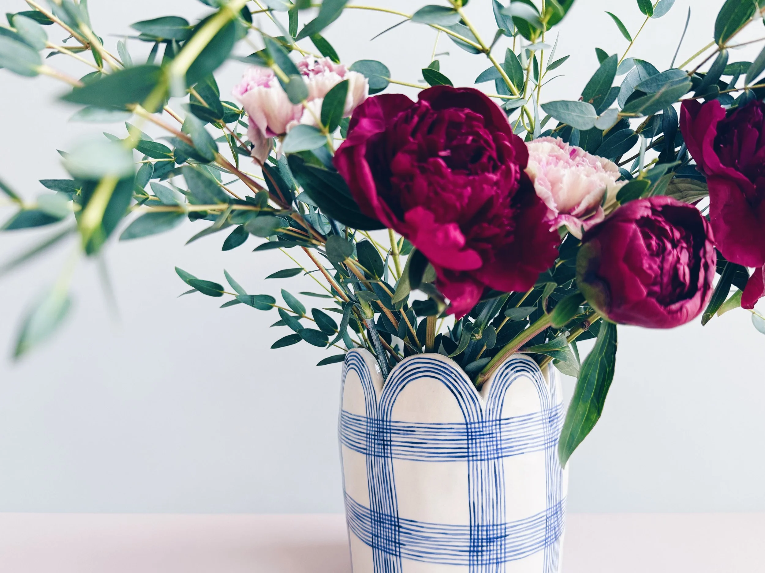 Blue and white, handmade ceramic vase.