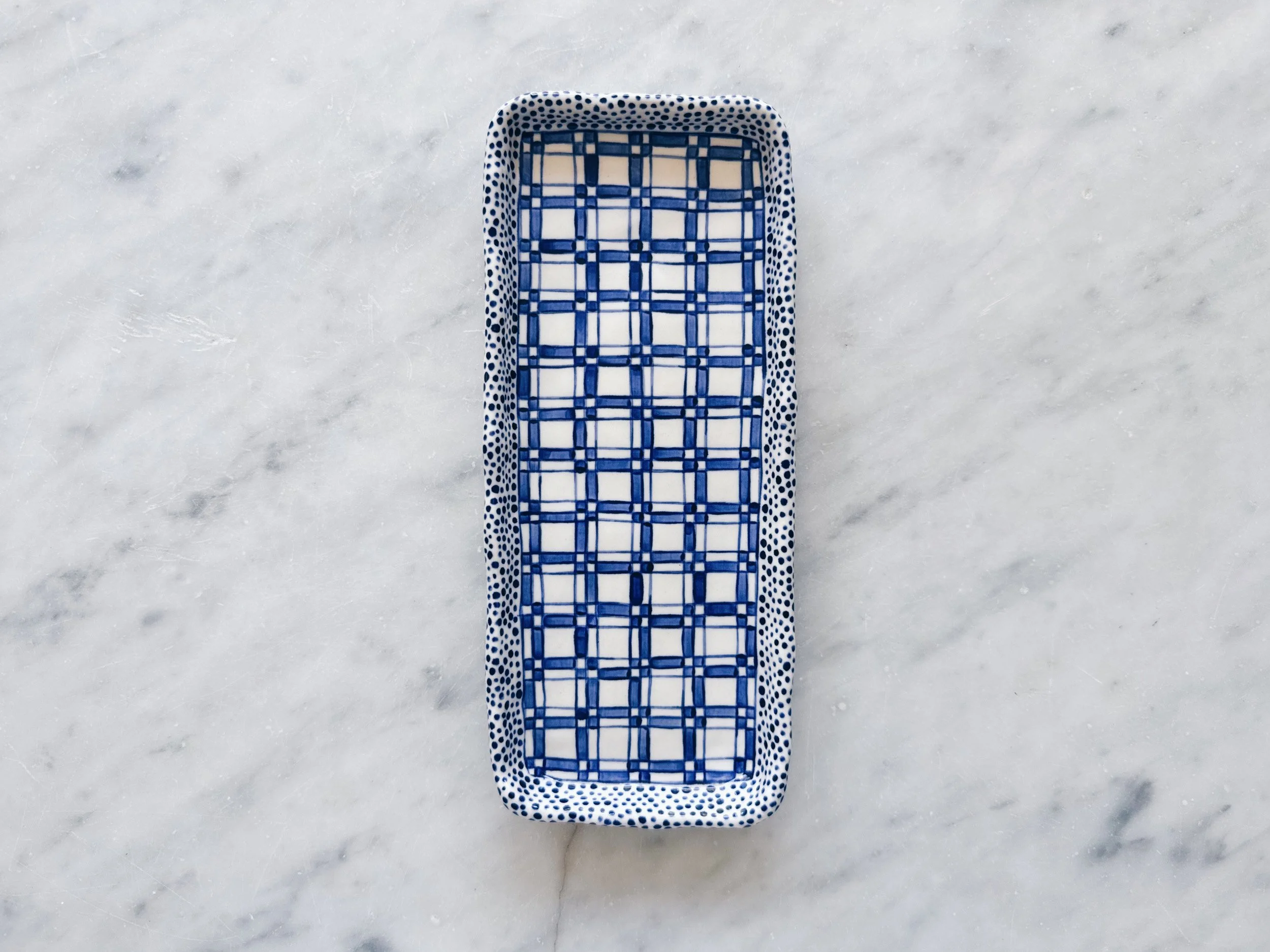 Blue and white, handmade ceramic plate.