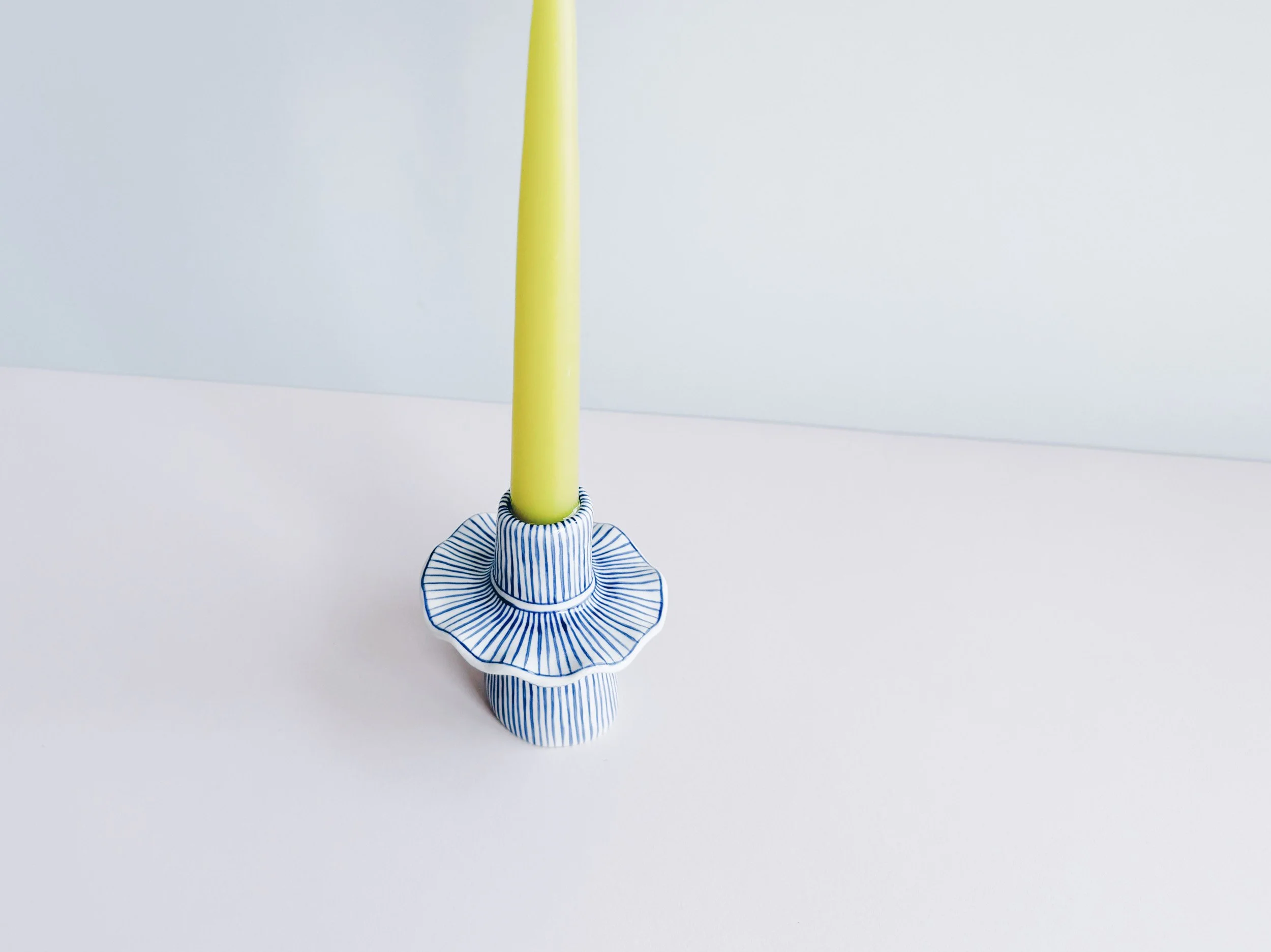 Blue and white, handmade ceramic candleholder.