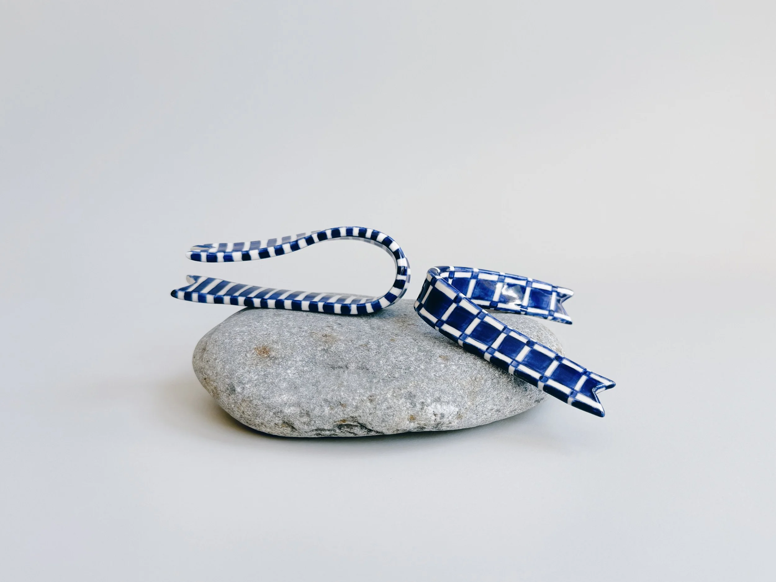 Blue and white, handmade ceramic ribbon