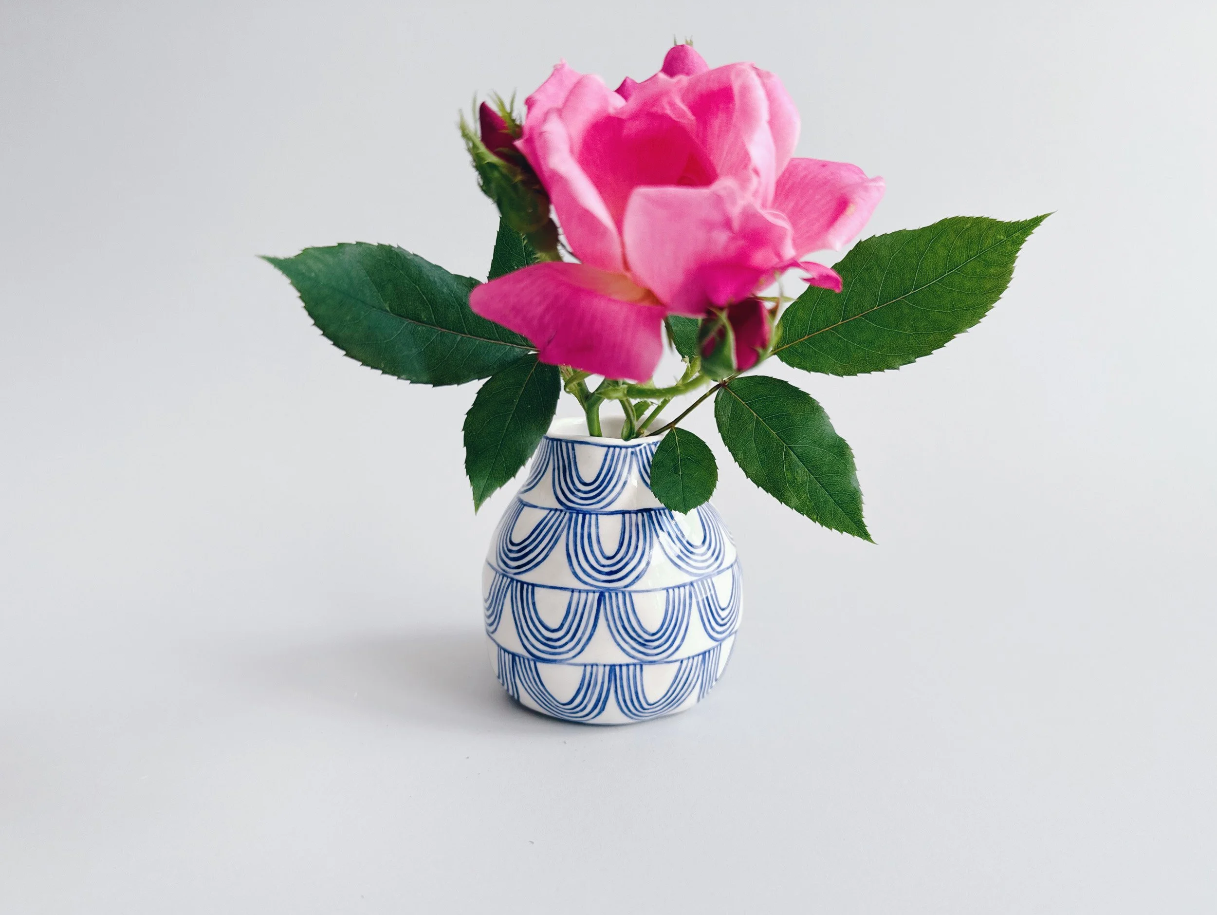 Blue and white, handmade ceramic vase.